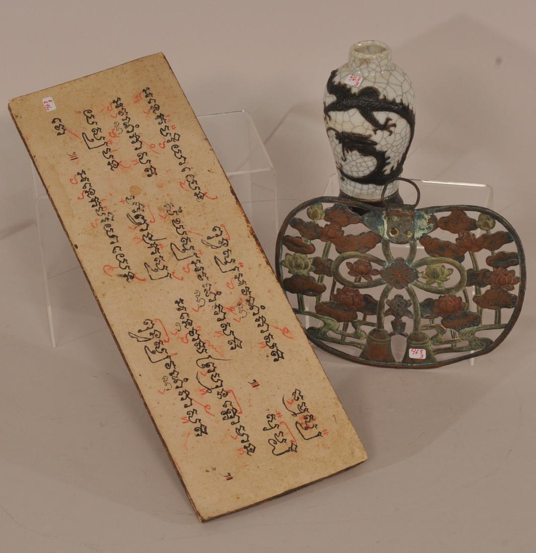 Lot of three.   To include: A repousse Buddhist plaque, (1 of 7)