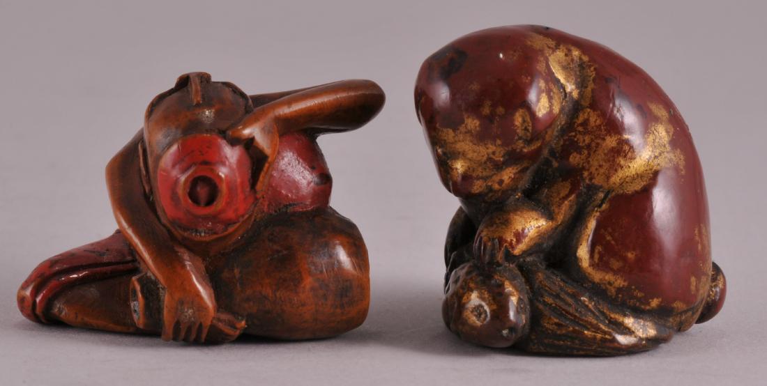 Two Japanese carved wood and lacquer decorated (1 of 4)