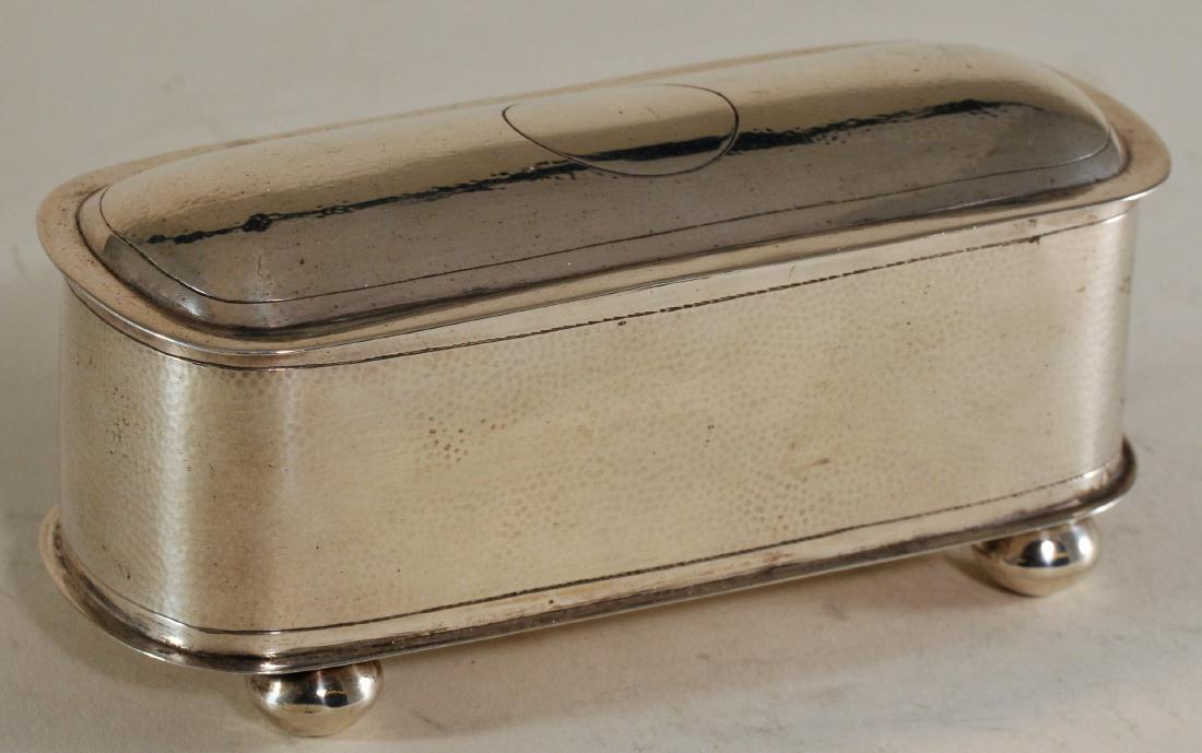 Oblong silver box. China. Early 20th century. Textured (1 of 3)