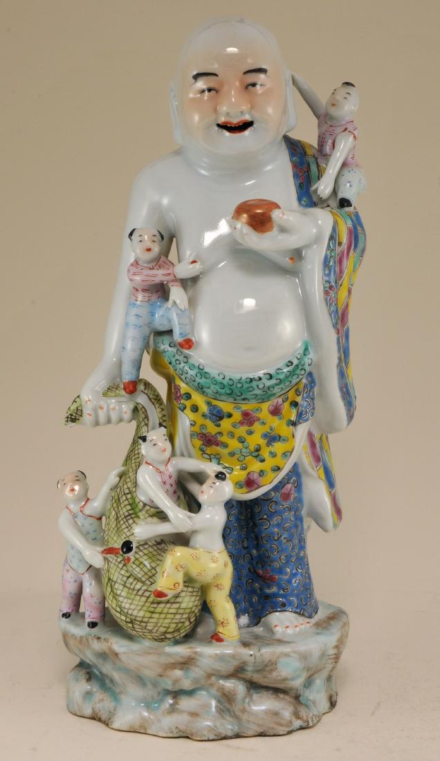 Porcelain figure. China. Early 20th century. Standing (1 of 7)