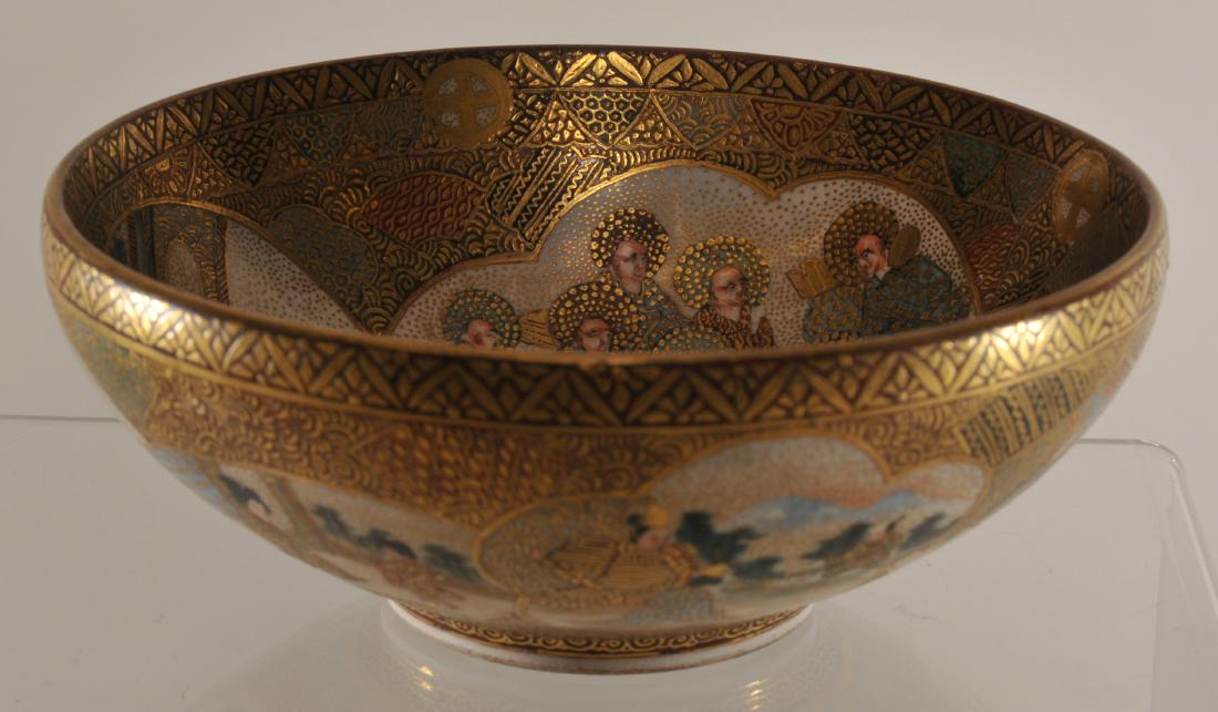 Pottery tea bowl. Japan. Meiji period. (1868-1912).: Pottery tea bowl. Japan. Meiji period. (1868-1912). Satsuma ware. Signed. Decoration of warriors, rakans and women in brocaded ground. 4-7/8".