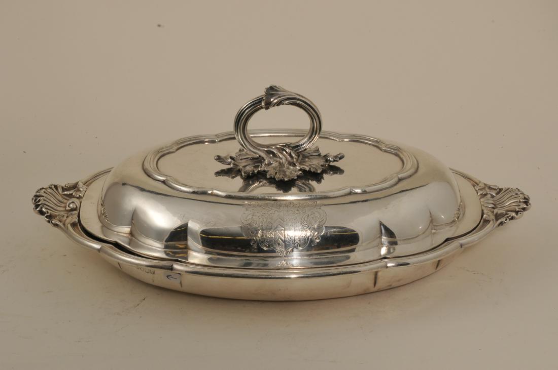 English Victorian Sterling Silver covered vegetable: English Victorian Sterling Silver covered vegetable dish by Hunt & Roskell Late Storr, Mortimer and Hunt. Armorial crest on cover and base. Leaf end vase. Leaf and branch detachable handle. Hallmarked