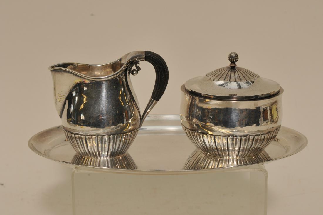 Georg Jensen Denmark sterling silver small ribbed body: Georg Jensen Denmark sterling silver small ribbed body decorated creamer and sugar with wood handle. Designed by Johan Rohde. Oval tray. Creamer and sugar marked Dessin and Johan Rohdek Designers mark