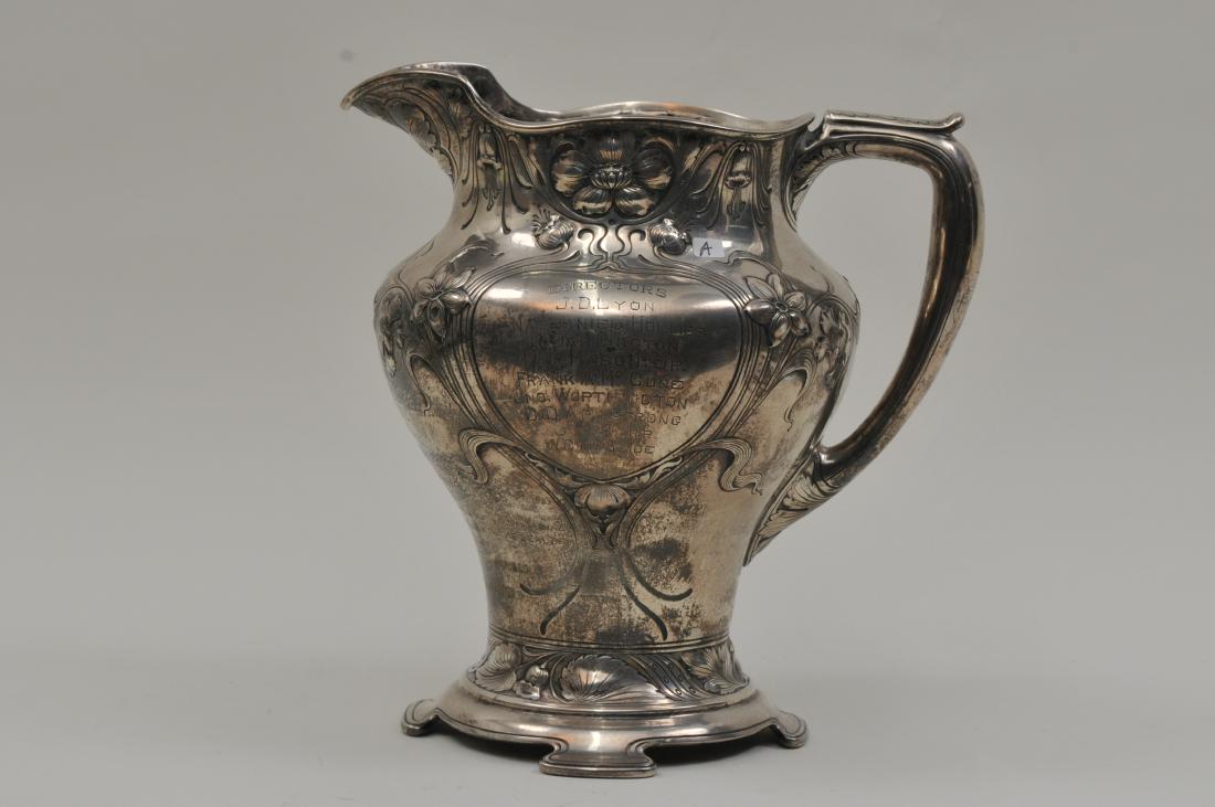 Large Gorham Presentation Athenic pattern footed water: Large Gorham Presentation Athenic pattern footed water pitcher. Art Nouveau floral relief decoration. "1863-1908 Charles F. Dean. Vice President and Cashier. The Board of Directors. Union National Ban