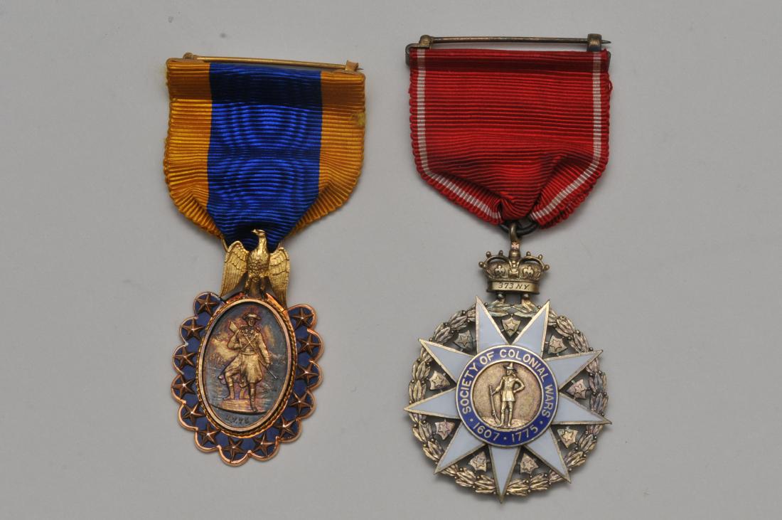 "Society of Colonial Wars" silver enameled round medal.: Society of Colonial Wars silver enameled round medal. Tiffany & Company marked to the right of the pilgrim in center. Reverse Indian head. Crown crest. Red ribbon. Inscribed 373 NY on crown. Together 