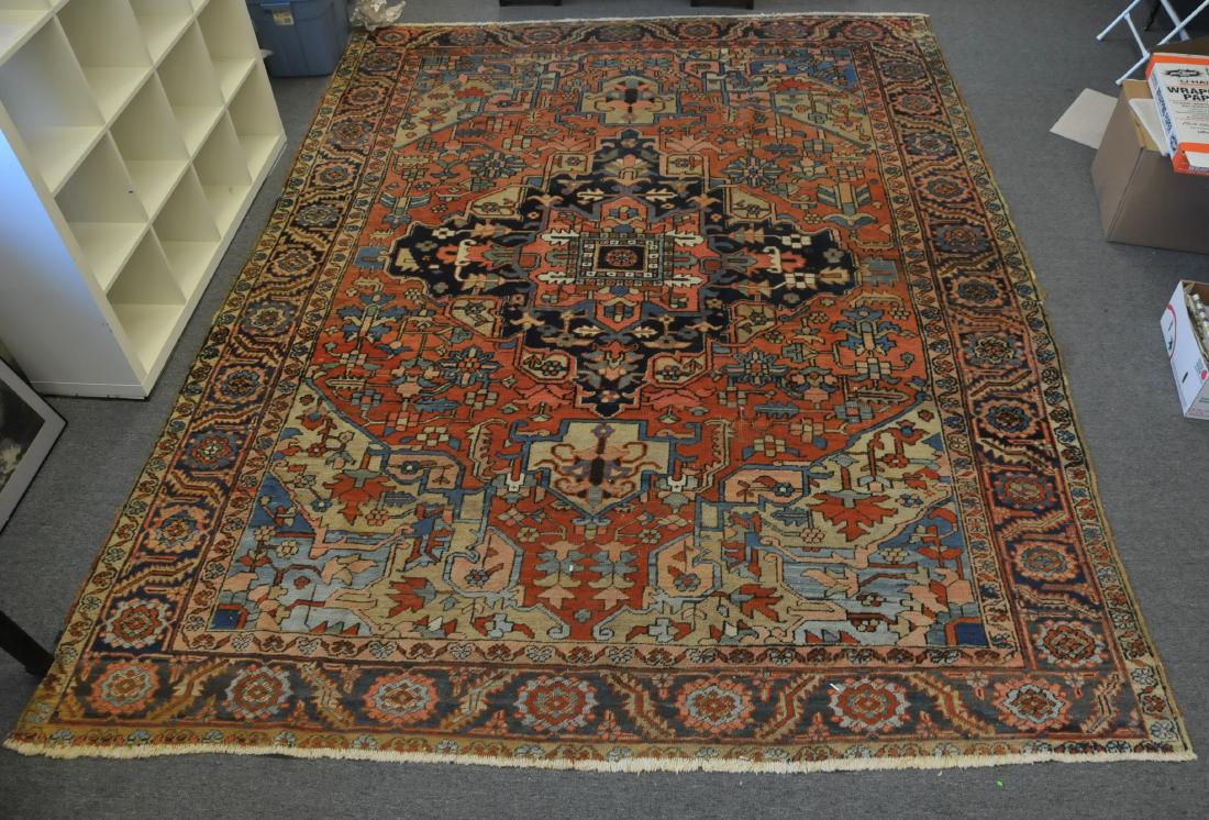 Antique room size Gorevan carpet. Rust field with: Antique room size Gorevan carpet. Rust field with salmon and blue medallion. Scattered wear. End borders with loss. 3 x 5 area of no pile. 9'3" x 12' 5".