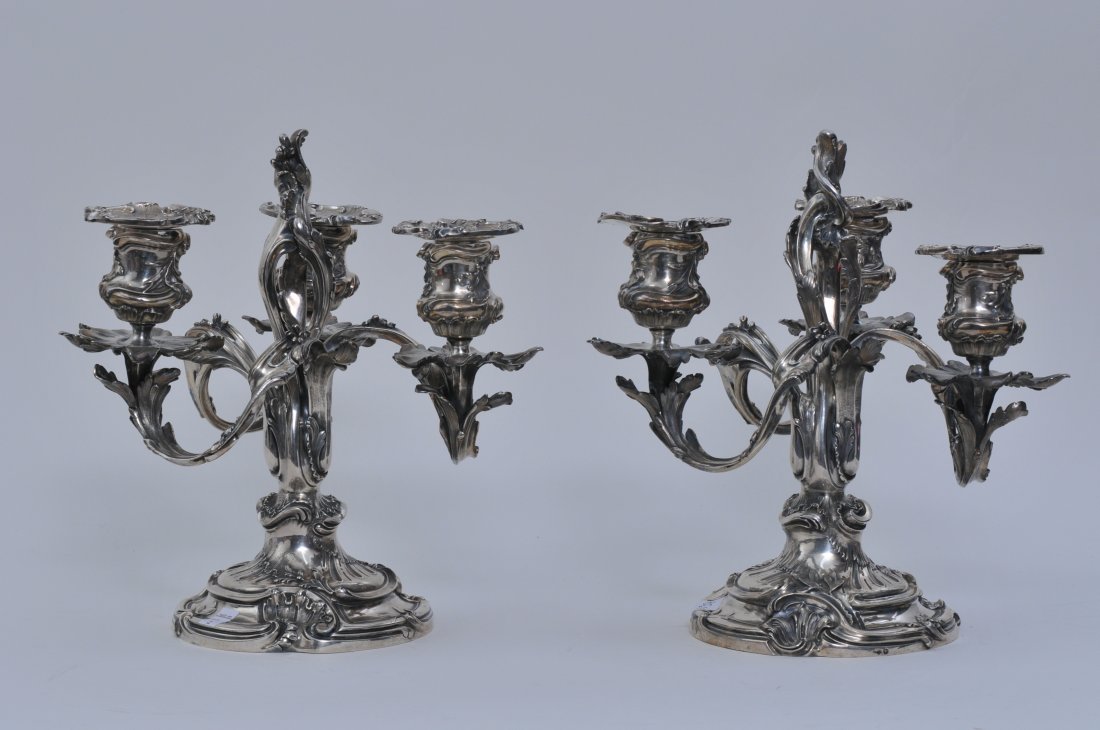 Pair of "L. Lapar-Sr De Beguin" Paris. French silver: Pair of "L. Lapar-Sr De Beguin" Paris. French silver three light candelabra. Cast silver Rococco style leaf form branches and decoration. Removable bobeches. Hallmarked on base rims and bobeches. 10-1
