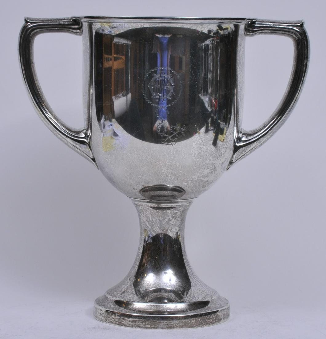 Large Gorham sterling silver two-handled trophy.: Large Gorham sterling silver two-handled trophy. "Presented to Captain Edward R. Geer. Superintendent of The Cape Cod and New York Canal Co. 1917". Decorated with Geer monogram and anchor and chain on