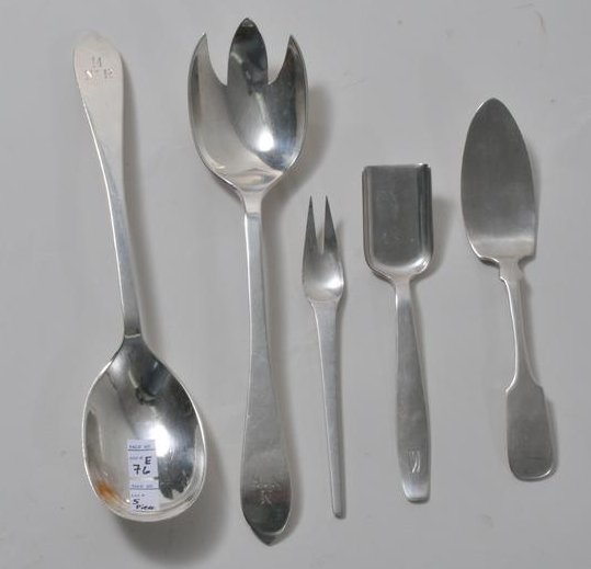 Lot of five hand wrought sterling silver serving pieces: Lot of five hand wrought sterling silver serving pieces by various makers. To include: Erikson pie server- 7". Georg Jensen two tined fork, 6". Aland Adler scoop soon- 6". Two piece serving set, monog
