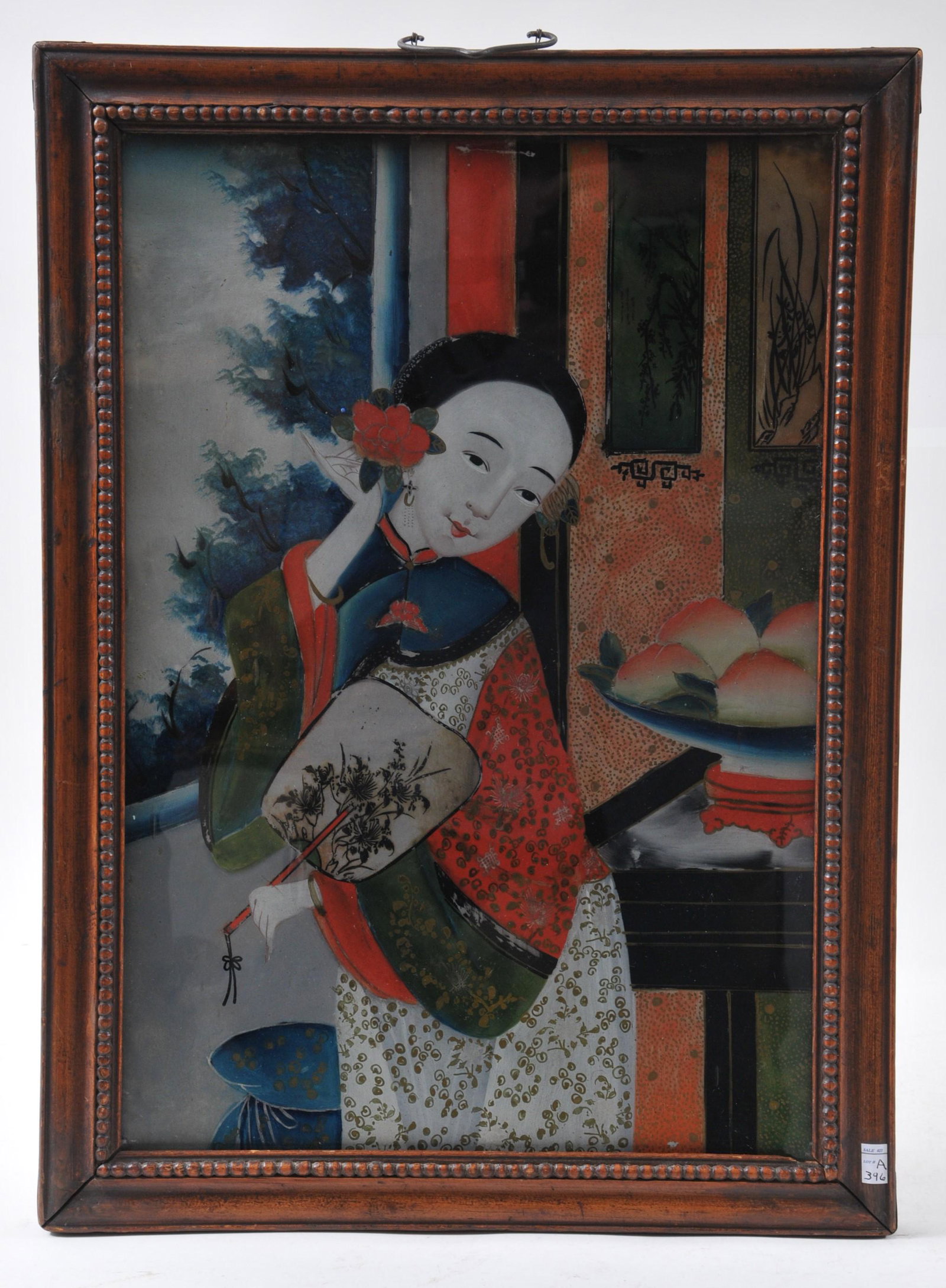 19th/20th century Chinese Export reverse glass painting: 19th/20th century Chinese Export reverse glass painting of a woman on terrace with a fan and screen. Minor loss to paint. Silver foil decoration.