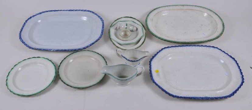 Lot of 18th century Leeds cream ware. Includes: Three: Lot of 18th century Leeds cream ware. Includes: Three platters, two with blue borders, one with green. Two cream boats, one with green decoration and one with blue decoration. Green decorated open sal