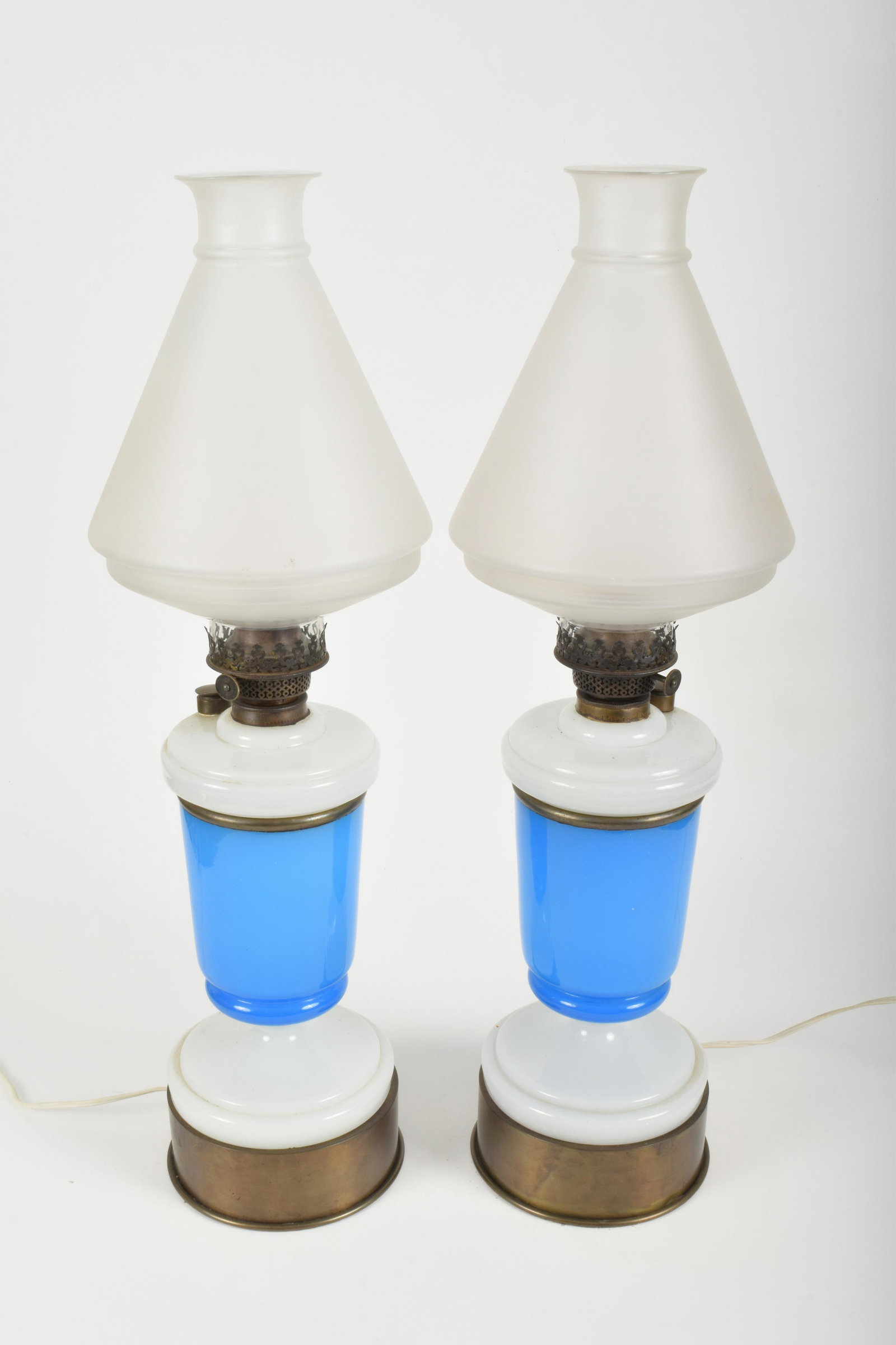 Opaline Glass Lamps, Pair: Pair of opaline lamps with blue decoration and two-part frosted shades signed H/M Vortis Illuminator. Converted to electricity Height 26 ½”