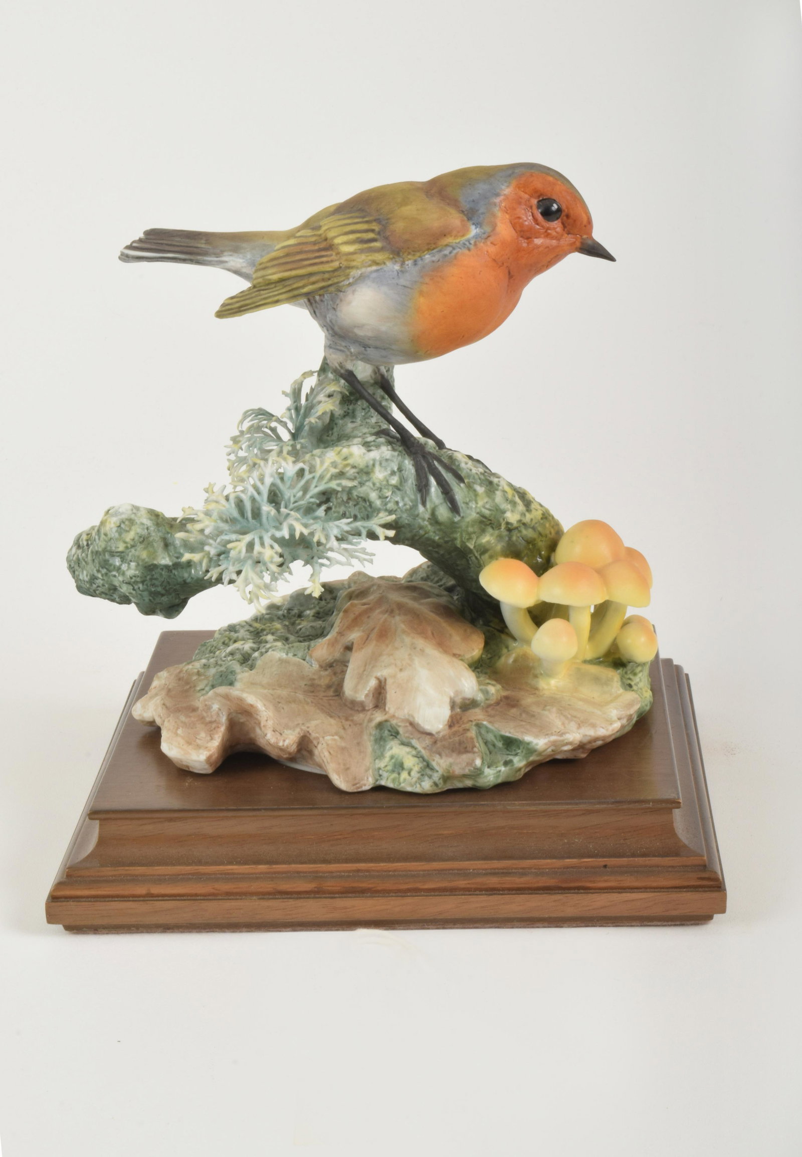 Dorothy Doughty for Royal Worcester "Robin": Dorothy Doughty for Royal Worcester. Bone China "Robin," made in England circa 1964. Approximately 6.5" high and 6.5" at widest point. With box. Minor loss to lichen.