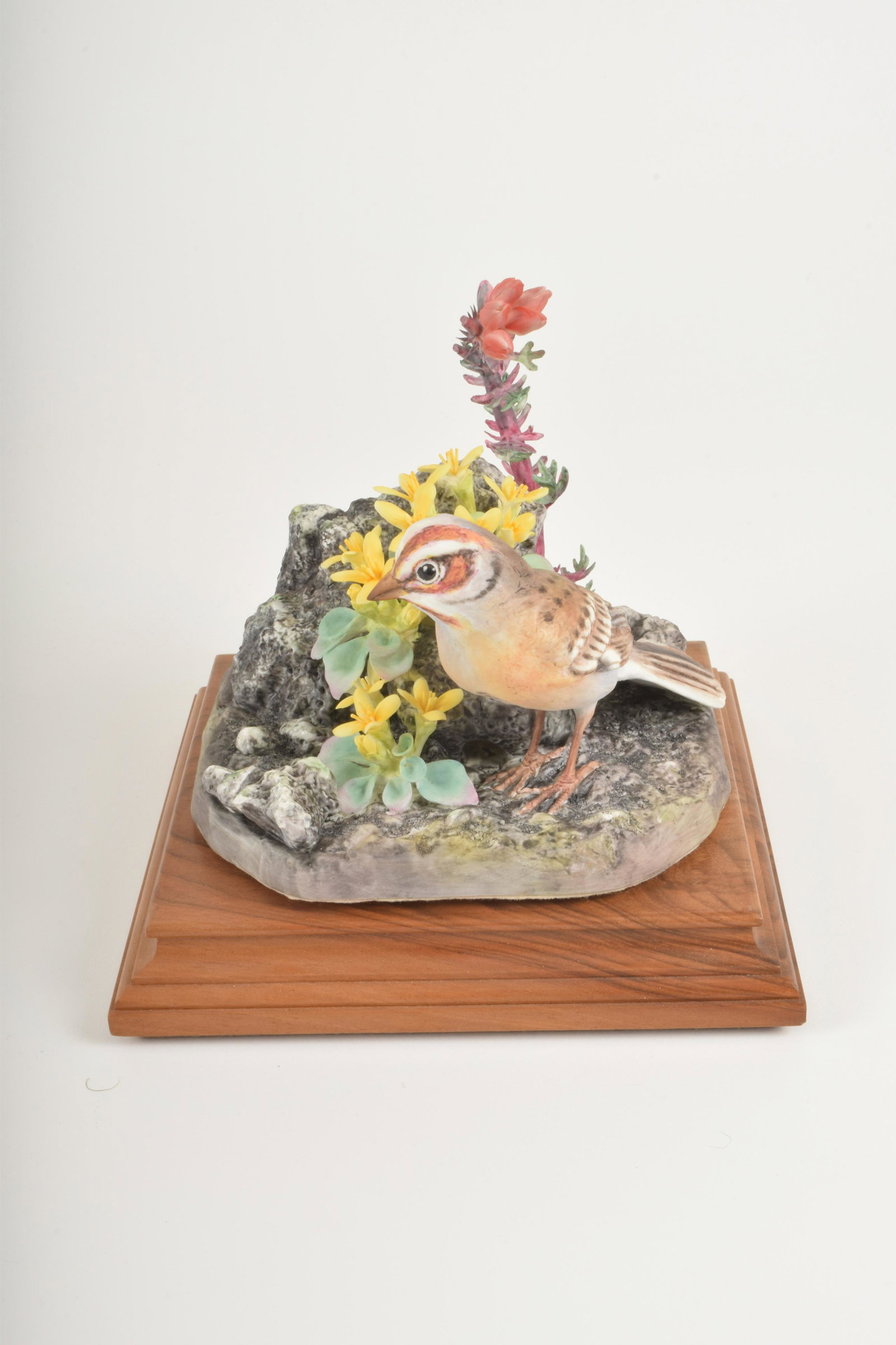Dorothy Doughty for Royal Worcester "Lark Sparrow with: Dorothy Doughty for Royal Worcester. Bone China "Lark Sparrow with Twinpod in Volcanic Ash," made in England circa 1966. Approximately 6" high and 6" at widest point. With box. Small loss to Twinpod.