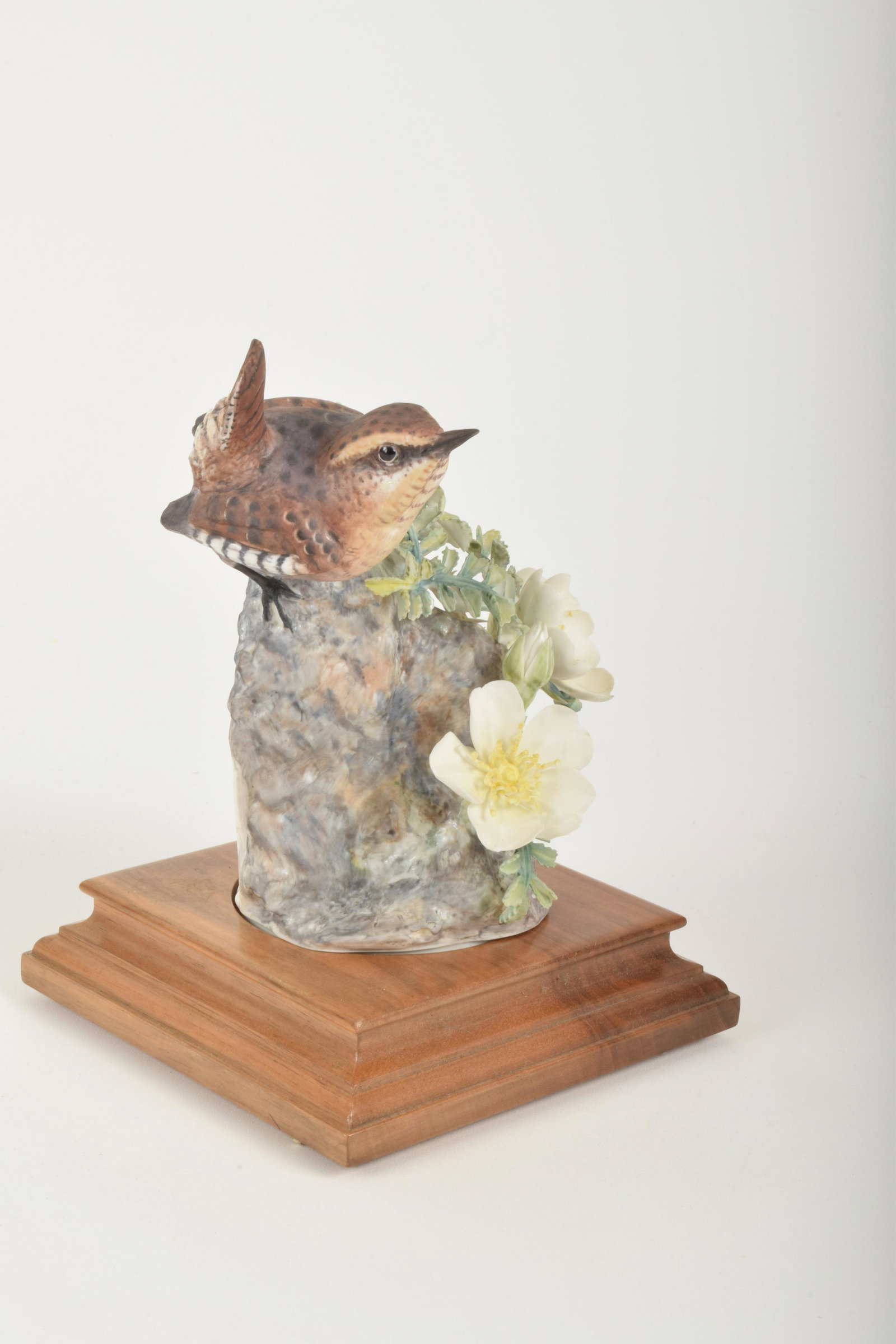 Dorothy Doughty for Royal Worcester "Wren with Burnet: Dorothy Doughty for Royal Worcester. Bone China "Wren with Burnet Rose," made in England circa 1964. Approximately 6.75" high and 5" at widest point. No box. Damage to leaf stems (two pieces included)