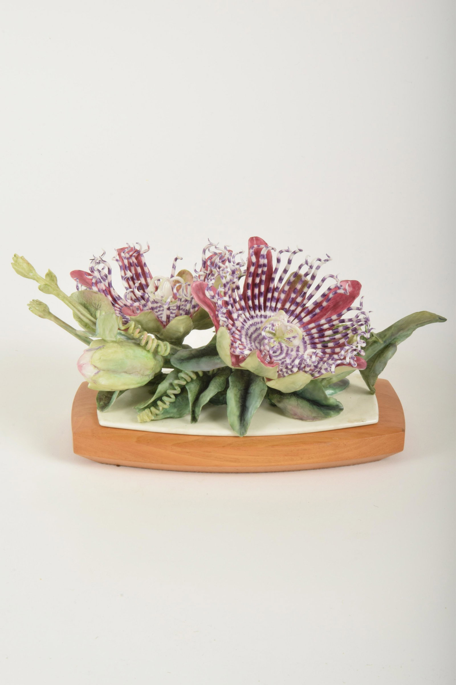 Ronald Van Ruyckevelt for Royal Worcester "Passion: Ronald Van Ruyckevelt for Royal Worcester. Bone China "Passion Flower," made in England circa 1960. Approximately 94.5" high and 9.5" at widest point. No box. Various striped petals broken and missing