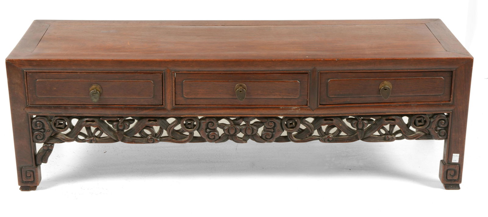 Hung mu Kang Table: Hung mu Kang table. China. 19 th Century. Three drawers. Aprons carved with ju-i and cash coins. 11-3/4” x 37” x 12-1/4”.