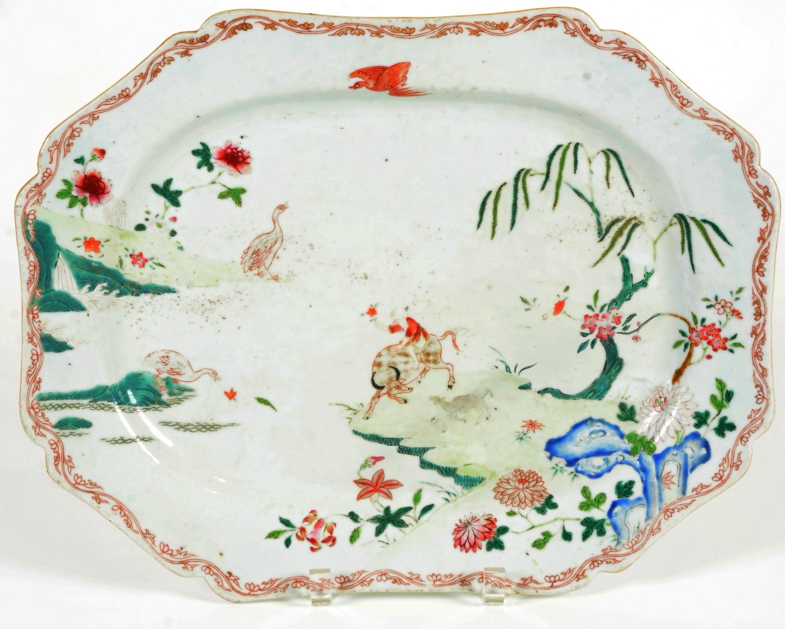 Famille Rose Export Porcelain Platter: Porcelain platter. China. 18 th Century. Rectangular with indented corners. Export ware. Famille Rose decoration of geese, water buffalo and flowers. 16” x 12-3/8”. Repaired.