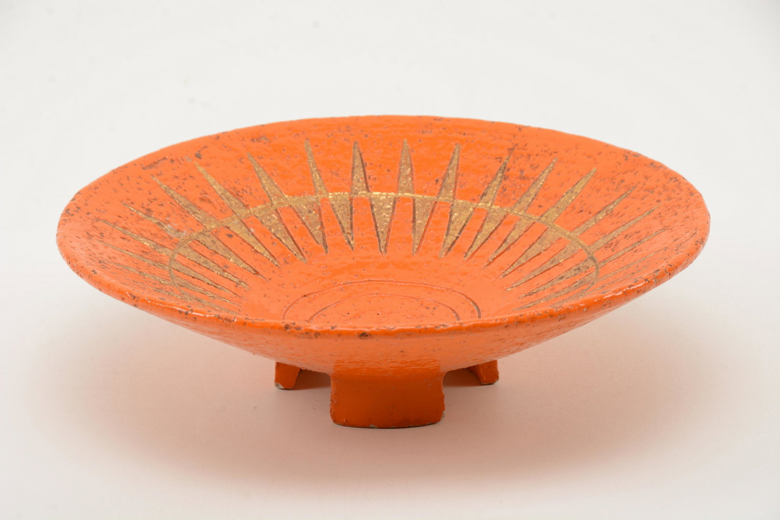 Italian Mid-Century Modern Pottery Centerpiece. Orange: Italian Mid-Century Modern Pottery Centerpiece. Orange decorated earthenware centerpiece with footed base and gold incised geometric pattern around interior. Marked â€œItaly” to underside. L