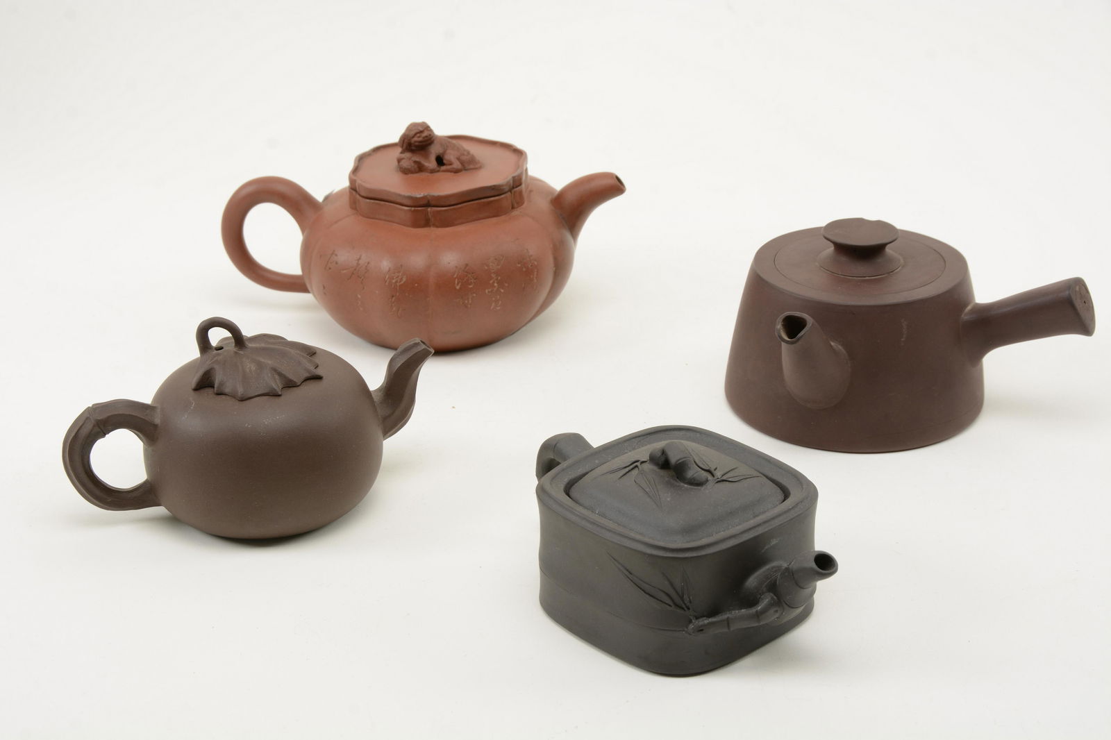 Chinese Yixing Clay Teapots. Lot includes [4] teapots (1 of 9)
