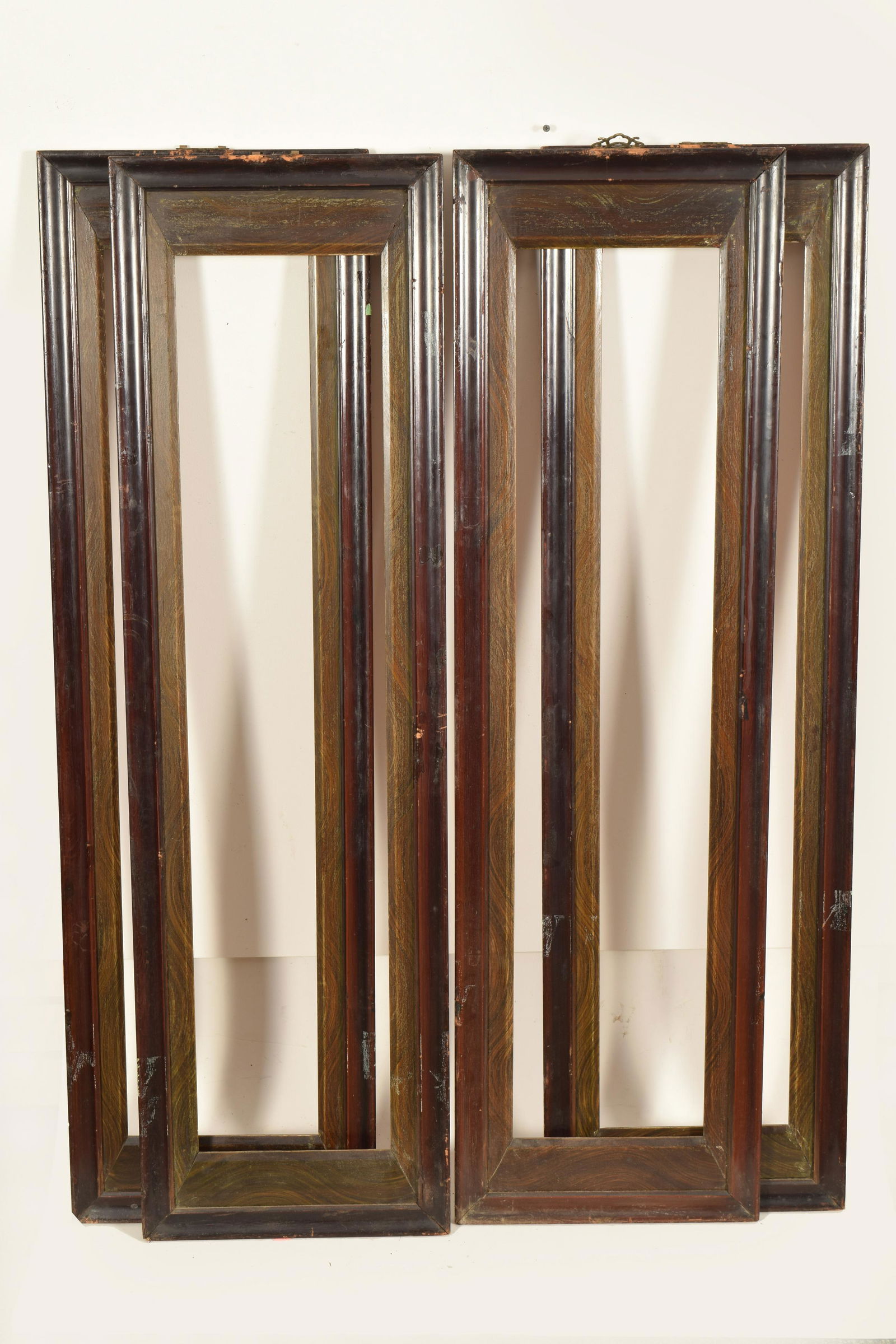 Set of Four Chinese Antique Wooden Frames. Wear to: Set of Four Antique Wooden Frames. Wear to edges and sides. Each approximately 49” x 14”. Interior measurement: 40.5” x 8.75”.