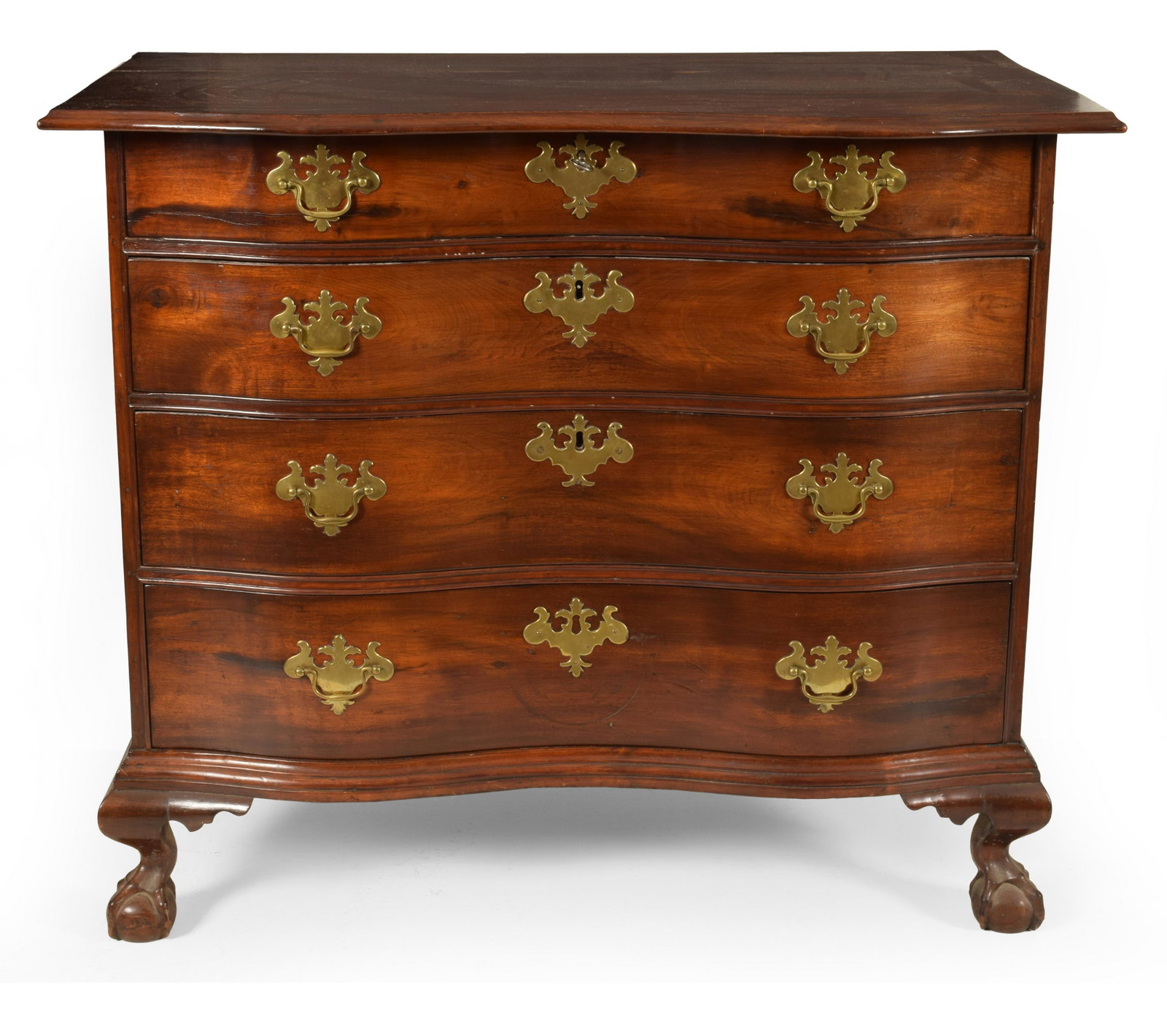 Chippendale mahogany oxbow chest of drawers. Boston: Chippendale mahogany oxbow chest of drawers. Boston circa 1780. Molded overhanging top over four graduated drawers on ball and claw feet. 33” Height 38.25 width22” depth Typical wear, fast