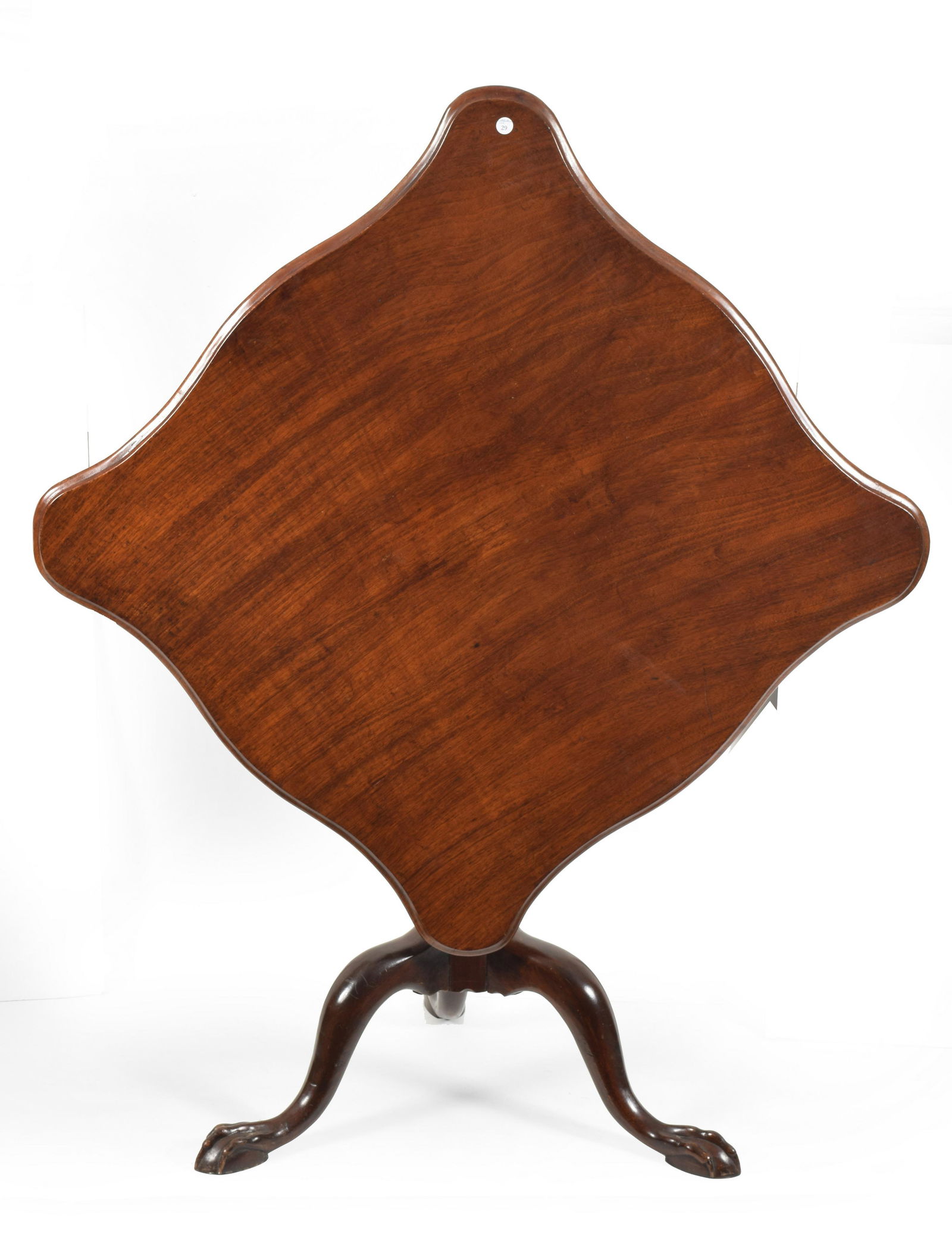 Chippendale mahogany serpentine tilt top tea table,: Chippendale mahogany serpentine tilt top tea table, Boston, Massachusetts, circa 1780. Richly grained one-piece top with molded edge. Heavy block and post with ring and vase turned shaft on cabriole l