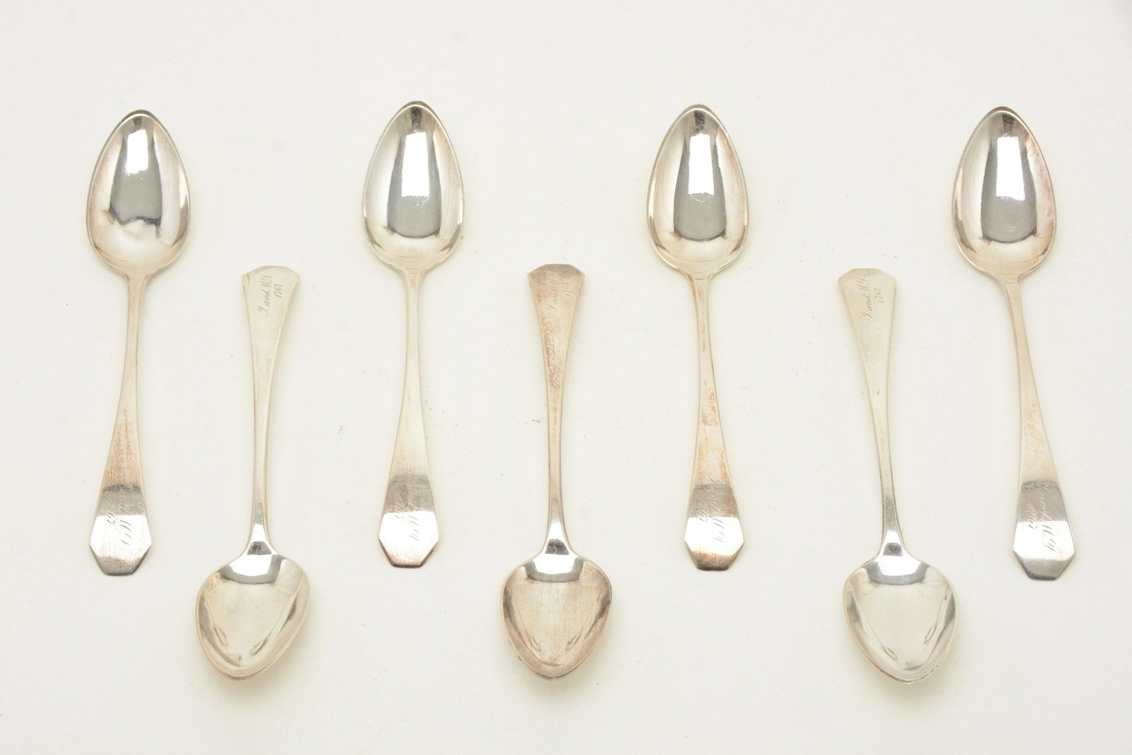 Robert Wilson colonial American coin silver dessert: Robert Wilson colonial American coin silver dessert spoons, NYC, circa 1805. Coffin end, drop. Length 6-7/8". Weight 1 troy ounce each. The monogram is a lengthwise script J and MD 1767. From the Davi