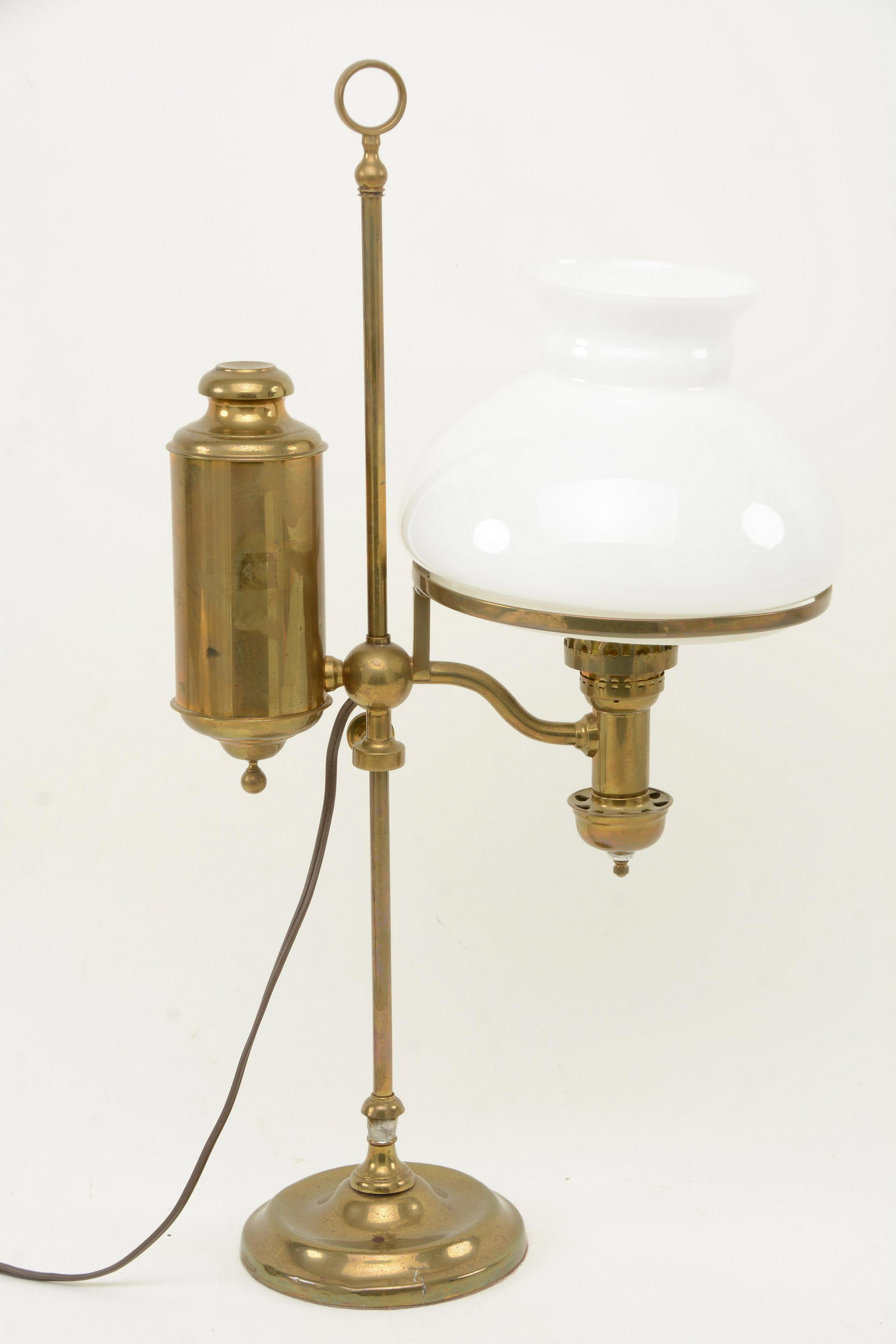Brass student’s lamp with white glass shade, 19th: Brass student’s lamp with white glass shade, 19th Century. 21” height. From the David Thomas Collection