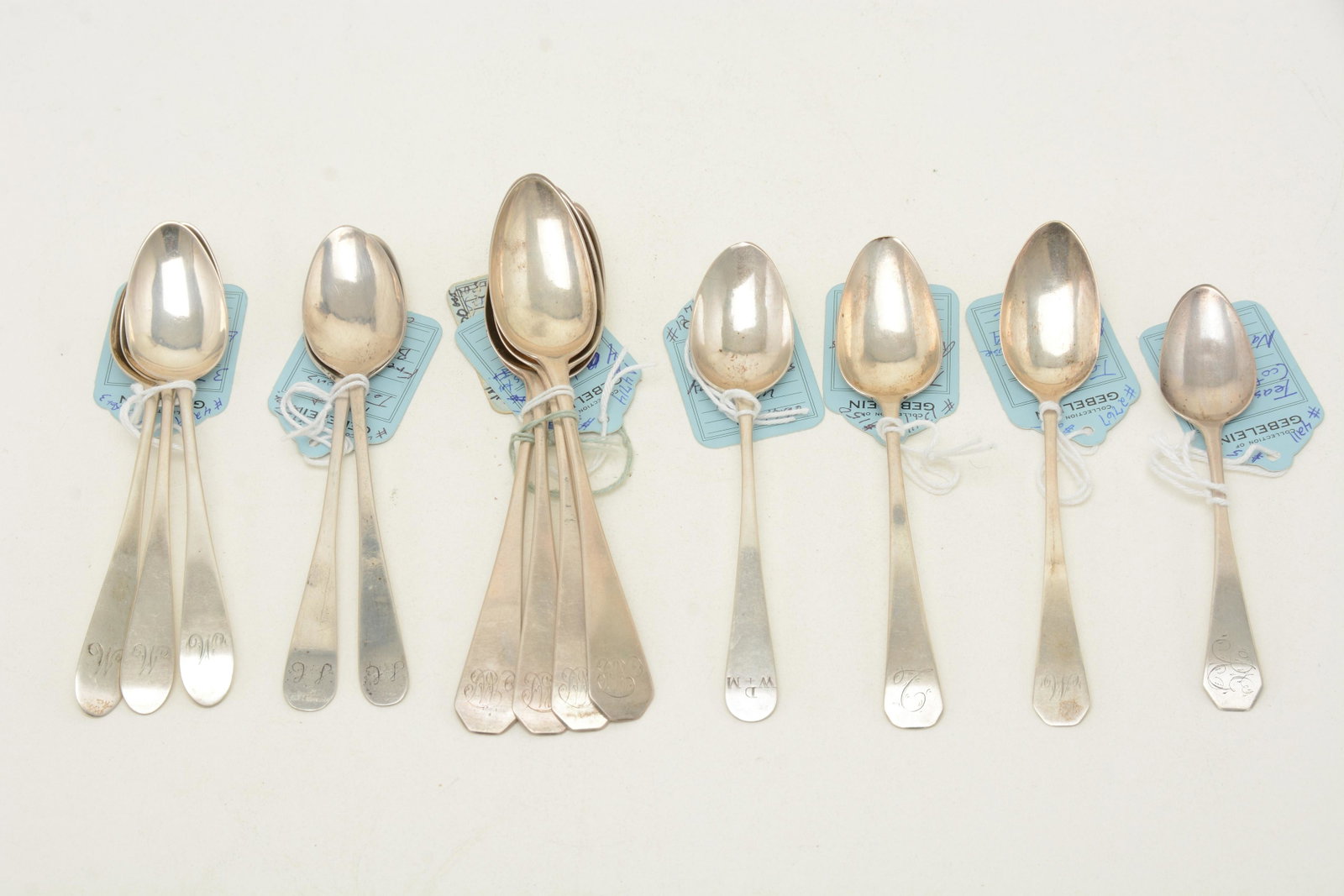 Massachusetts colonial coin silver teaspoons, c. 1800.: Massachusetts colonial coin silver teaspoons, c. 1800. Includes sets of [3] teaspoons by Ebenezer Moulton (Boston), [4] by Joseph Foster (Boston), a pair by Freeman Hinckley (Barnstable), and single t