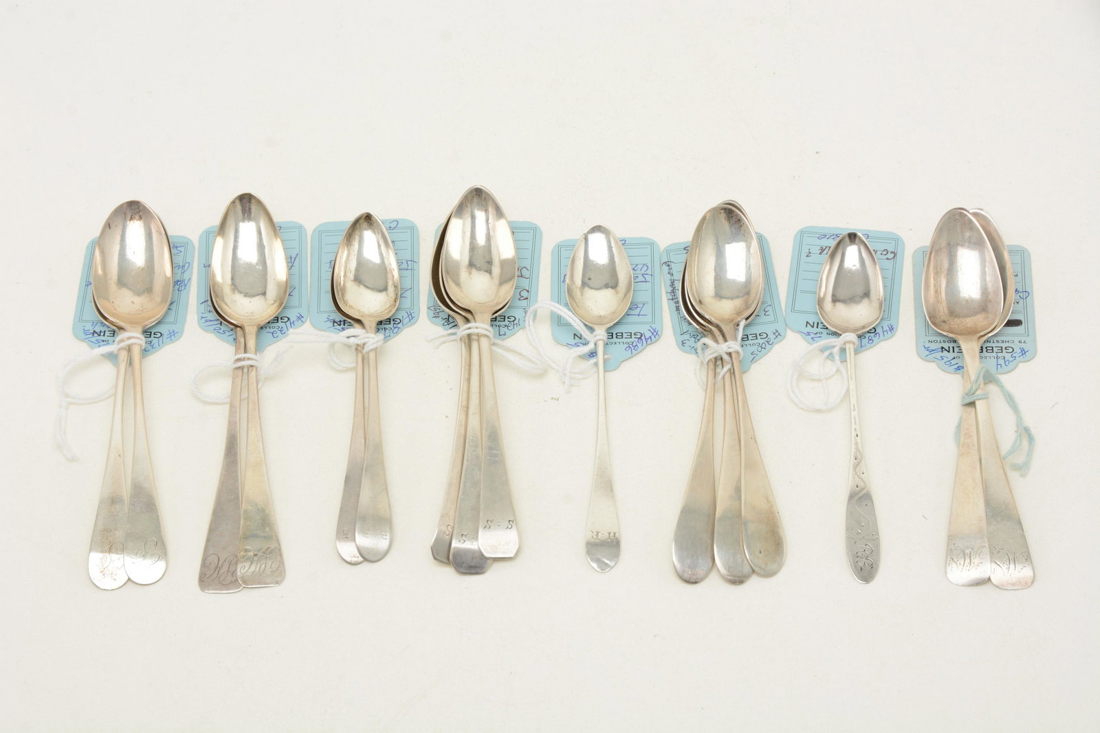 Massachusetts colonial coin silver teaspoons, ca. 1800.: Massachusetts colonial coin silver teaspoons, ca. 1800. Lot includes sets of [3] by David Tyler, [2] by Caleb Warner, [2] by Robert Brookhouse, [2] by Rufus Farnam, [2] by Joseph Loring, and [3] by Jo