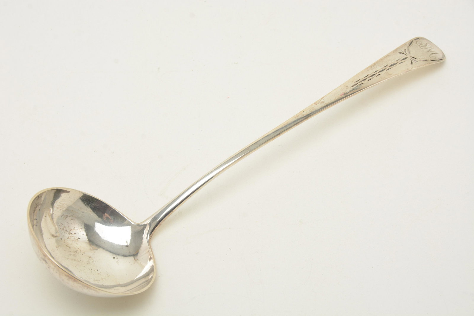 Samuel Bowne colonial American coin silver coup ladle,: Samuel Bowne colonial American coin silver coup ladle, NY, circa 1800. Bright cut, oval end, oval drop. Marked S BOWNE in a rectangle. Length 14-3/4". Bowl diameter 3-3/4". Weight 6 troy ounces. The m