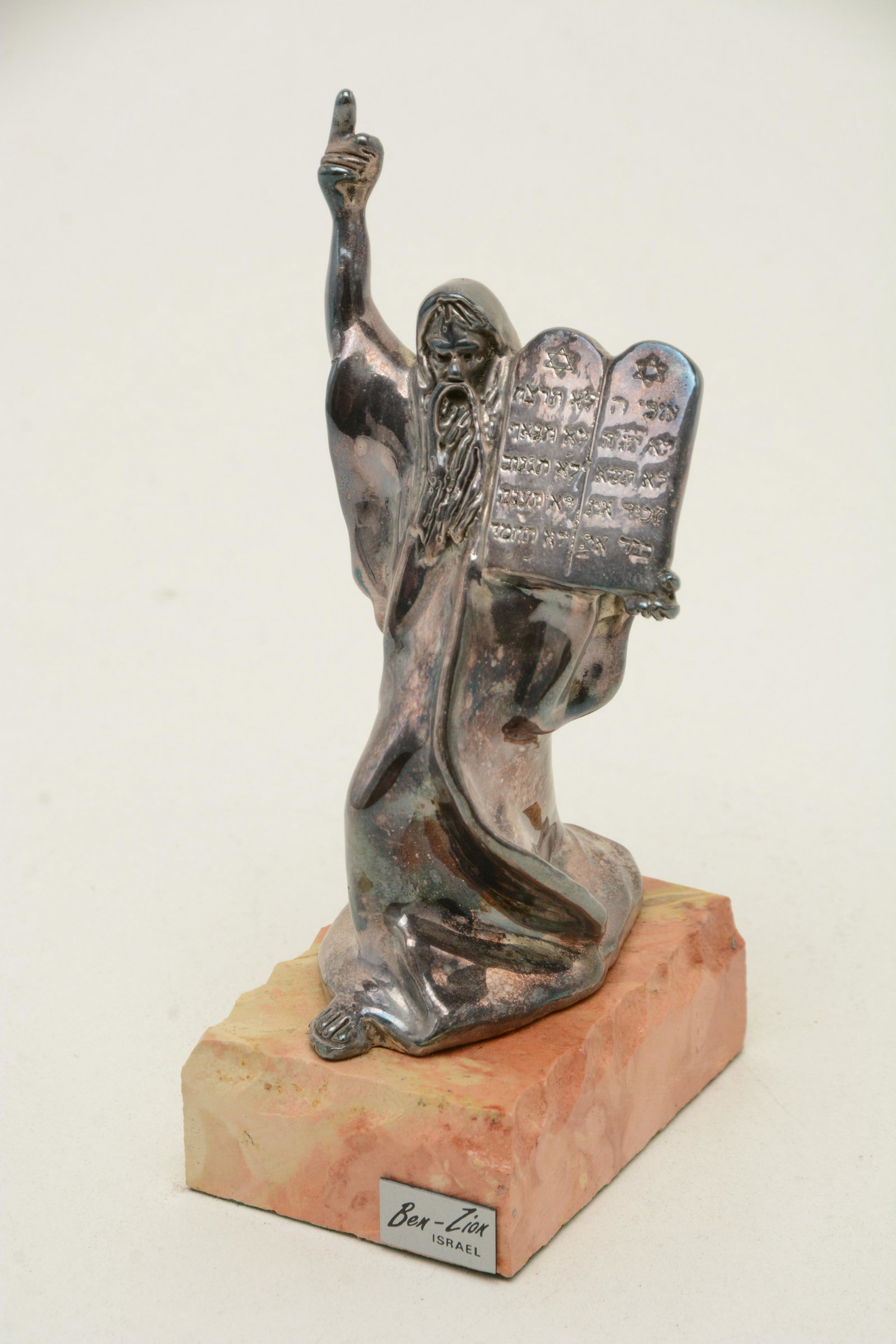 Sterling silver Judaica sculpture of Moses by Ben-Zion,: Sterling silver Judaica sculpture of Moses by Ben-Zion, Israel. silver marked 925. Full length silver statue of Moses with raised right arm, left arm holding two tablets of 10 Commandments (in Hebrew?