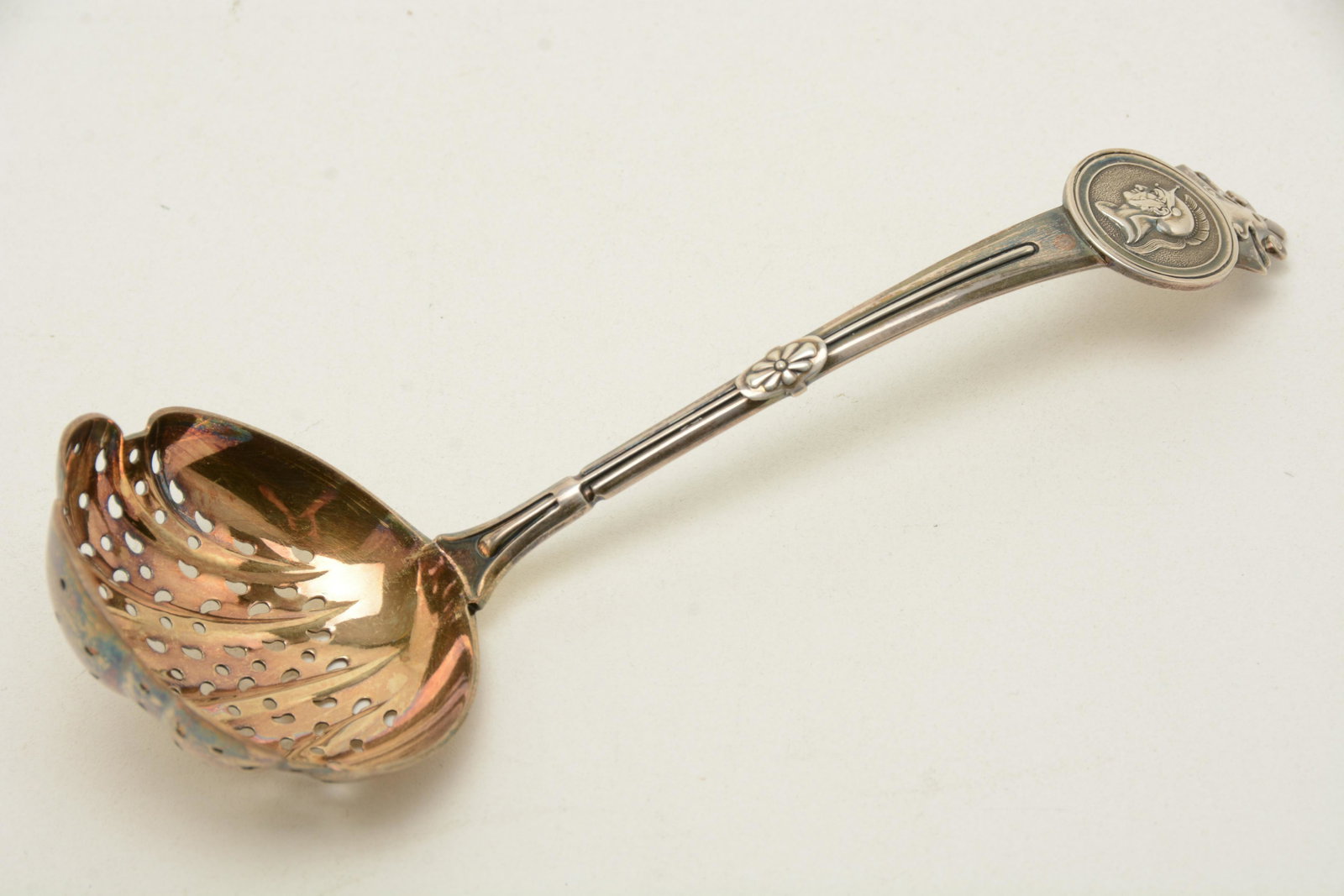Gorham sterling silver medallion sifter spoon. Marked:: Gorham sterling silver medallion sifter spoon. Marked: [Gorham logo] PAT.1864 TIFFANY&CO. STERLING (see p. 51 of Soeffing's "Silver Medallion Flatware"). (Made by Gorham, retailed by Tiffany). Gold wa