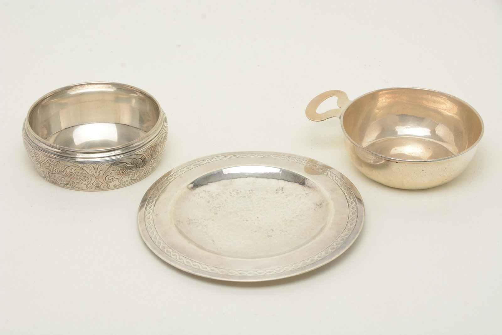 Sterling silver tableware including Tiffany and: Sterling silver tableware including Tiffany and Kunkler. Porringer by E. H. Breese (Chicago, 1930s, 3.70 ozt). Engraved bowl or dish by Tiffany & Co. (6.19 ozt). Small tray or plate by Adolphe Kunkler