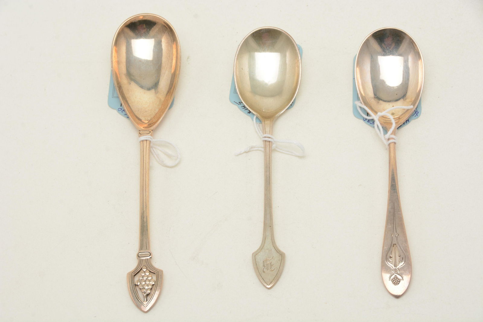 Arthur Stone sterling silver spoons. Sugar spoon with: Arthur Stone sterling silver spoons. Sugar spoon with handle is a modified shield or spade shaped. Length 6-1/8". Weight 19 dwt. The monogram is an Old English B on the top of the handle. Jelly spoon