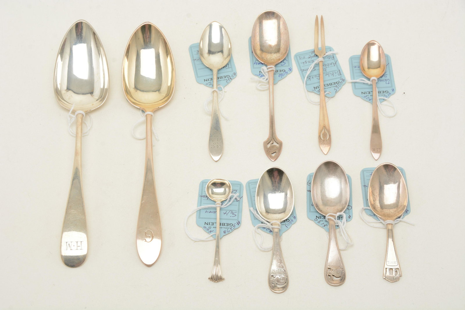 Arthur Stone sterling silver utensils. Lot includes: Arthur Stone sterling silver utensils. Lot includes [10] total pieces, featuring child’s spoons, sugar spoon, pickle fork, salt and demitasse spoons, and serving spoons. Some pieces with monogra