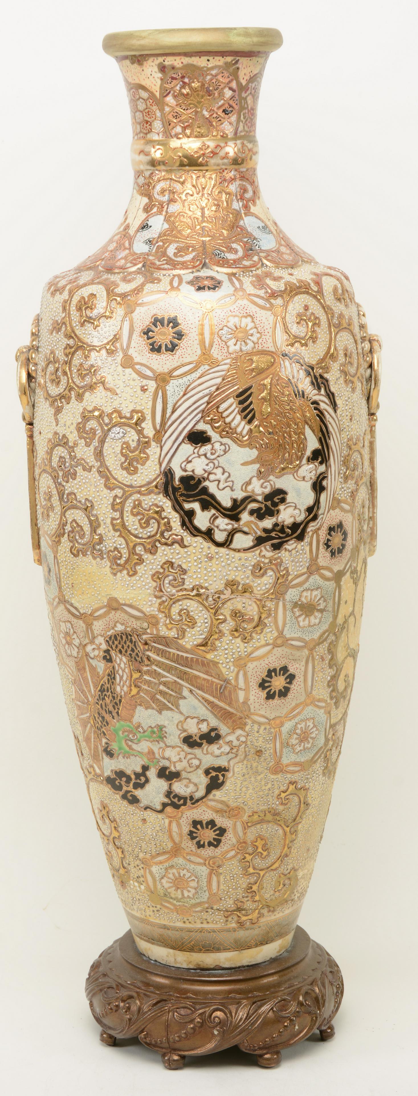 Large Satsuma (Noritake) Amphora Vase, Japan,: Large Satsuma (Noritake) Amphora Vase, Japan, Meiji/Taisho 20th century, the elongated body heavily decorated in raised gilt design depicting flying phoenix on a white stippled background, with bronze