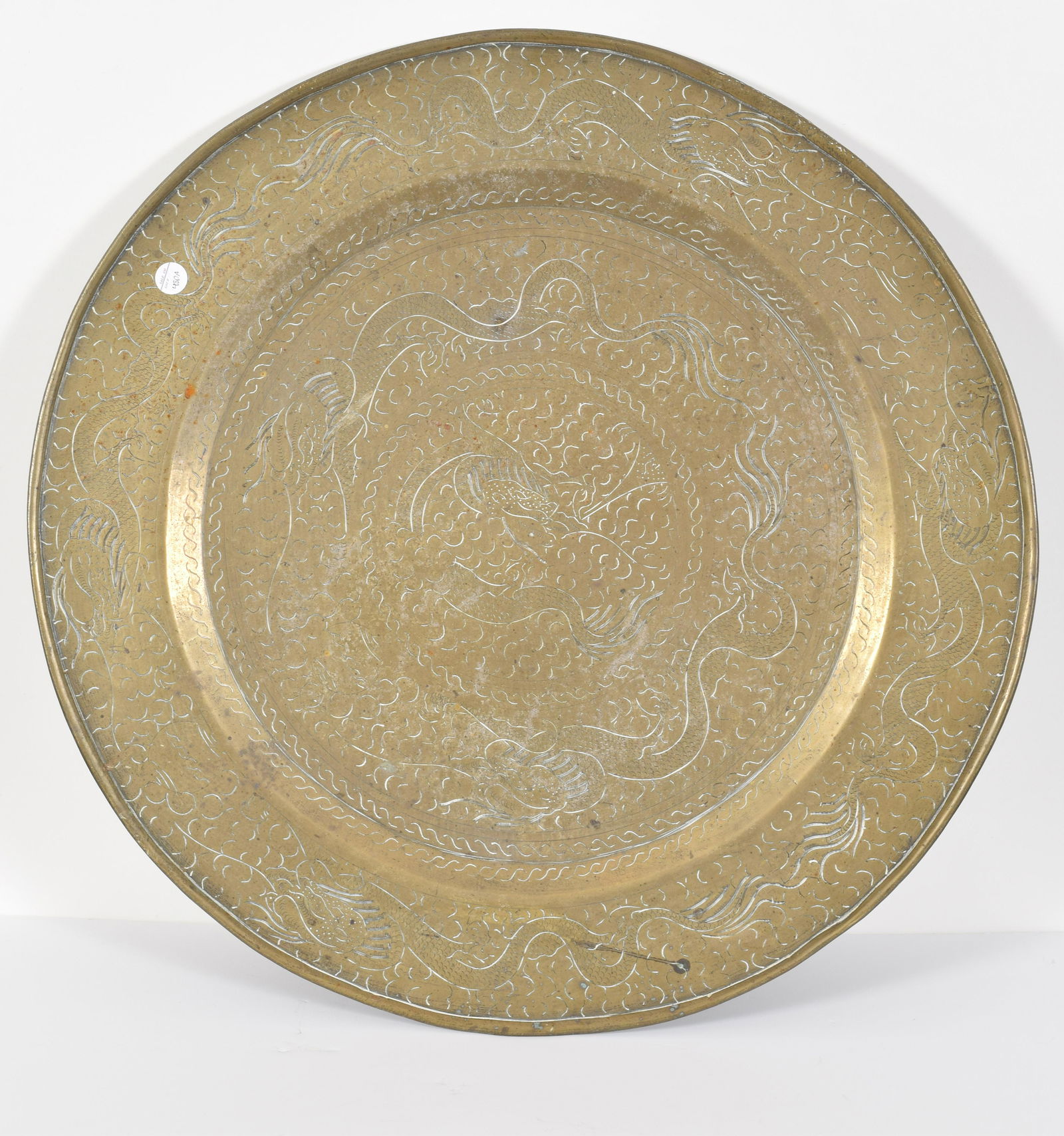 Large Brass Tray, China, 19/20th century, depicting a: Large Brass Tray, China, 19/20th century, depicting a dragon. Depth 24 in.