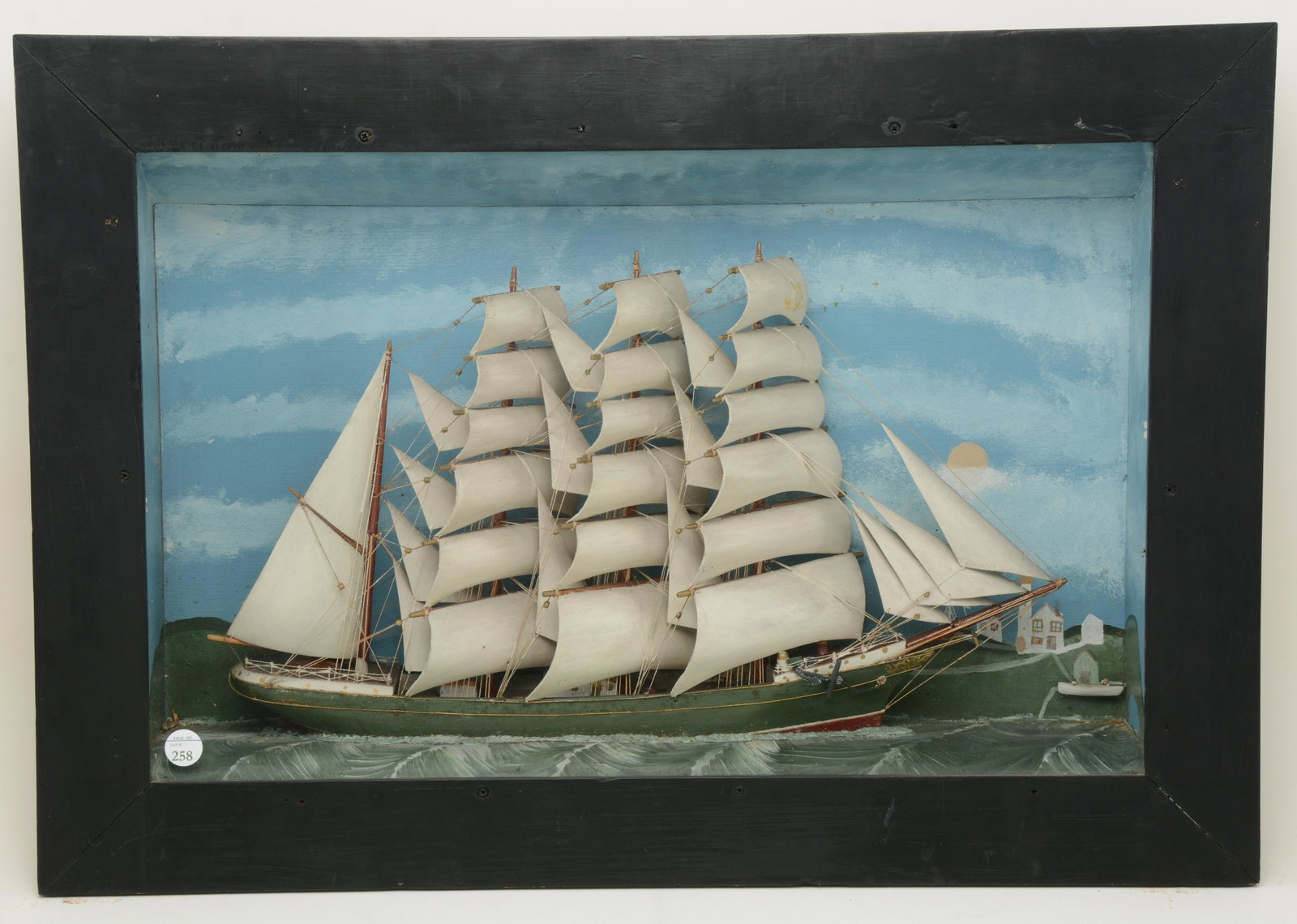 19th Century American folk art carved wood ship diorama: 19th Century American folk art carved wood ship diorama featuring 4-mast ship with New England coastal landscape paint decoration. Overall: 17.25in x 24.75in.