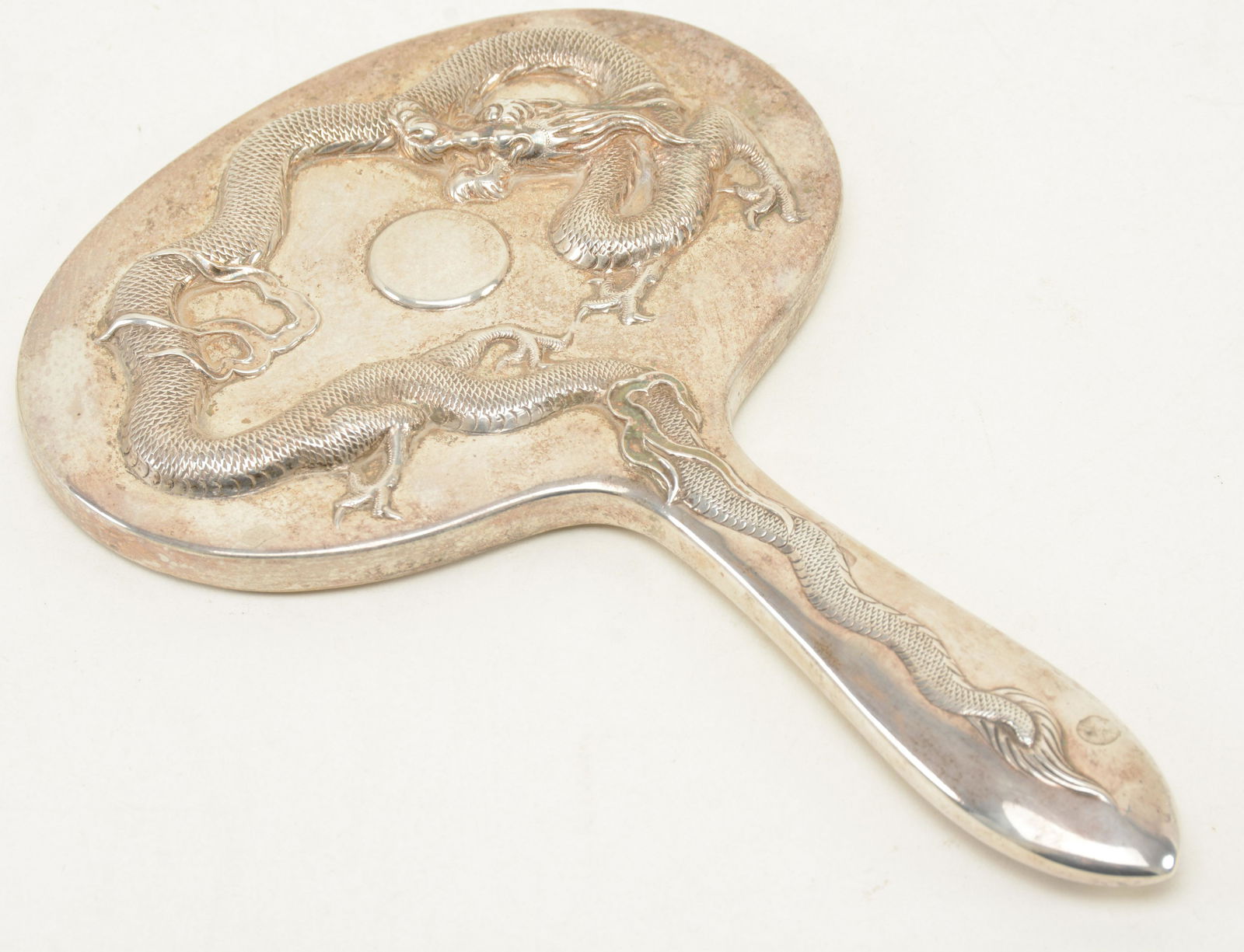 Chinese silver hand mirror with dragon relief. Beveled (1 of 6)