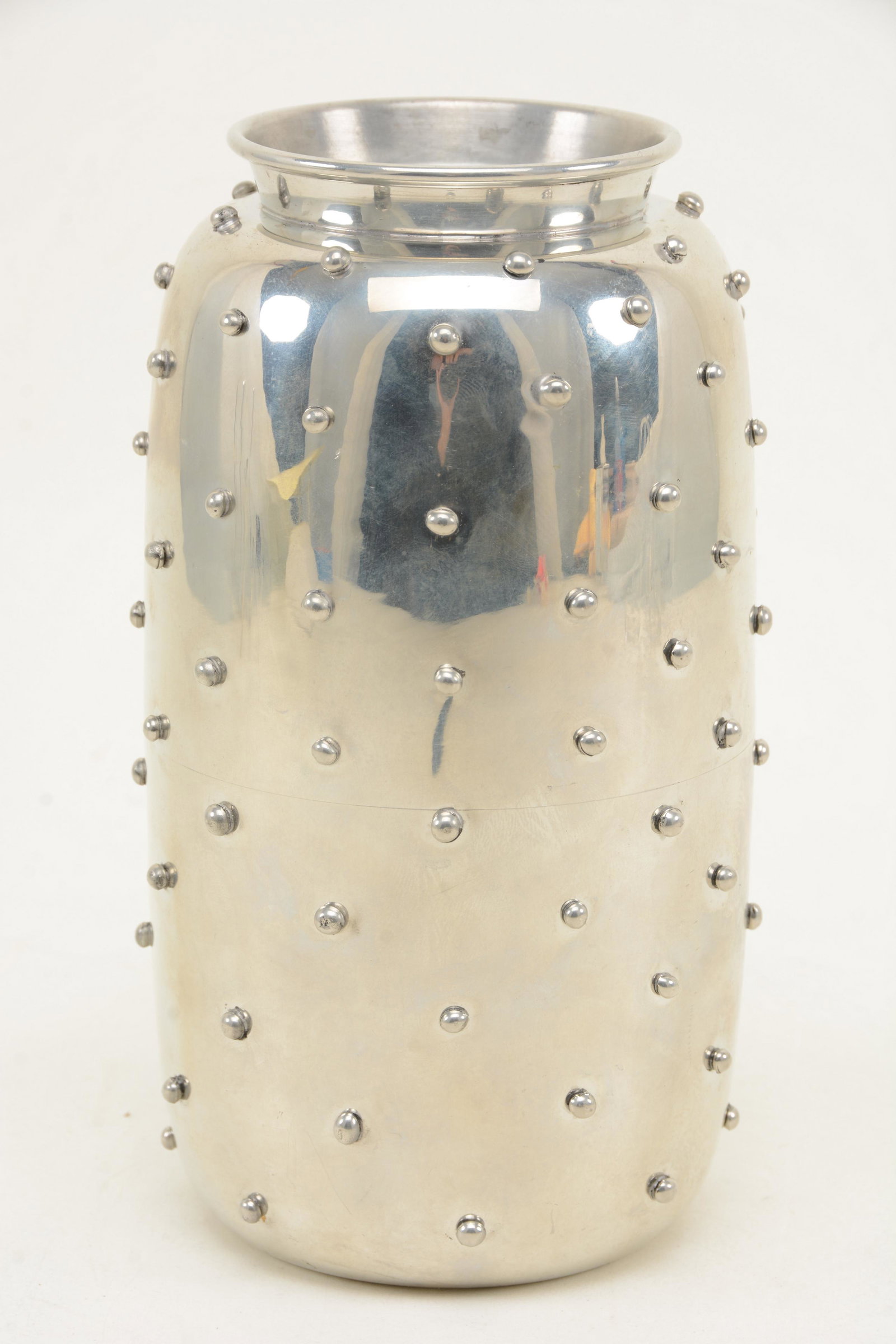Leon Fontier pewter hobnail vase, 1990. Cylindrical: Leon Fontier pewter hobnail vase, 1990. Cylindrical form with pinched neck and flared rim and hobnail body. Signed and dated to underside. 8.5 in height.