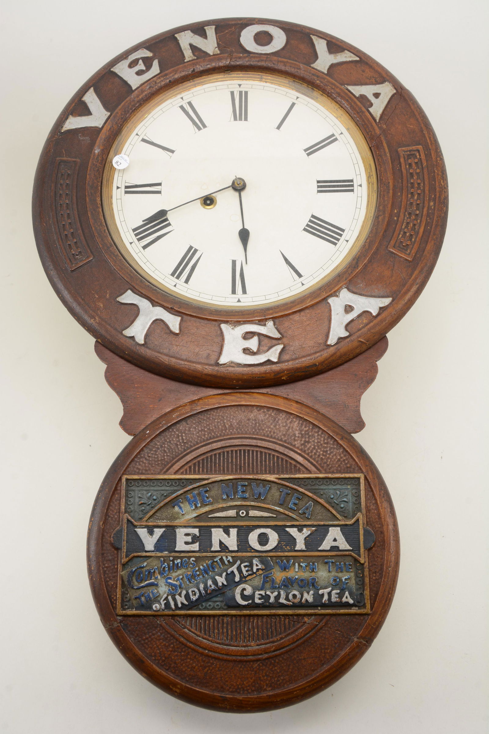 Venoya tea advertising wall clock, with a carved and (1 of 12)