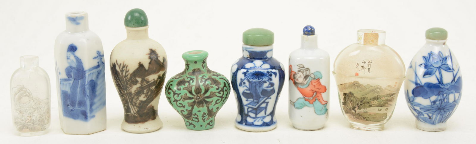 8 snuff bottles. Porcelain and glass with paint (1 of 8)