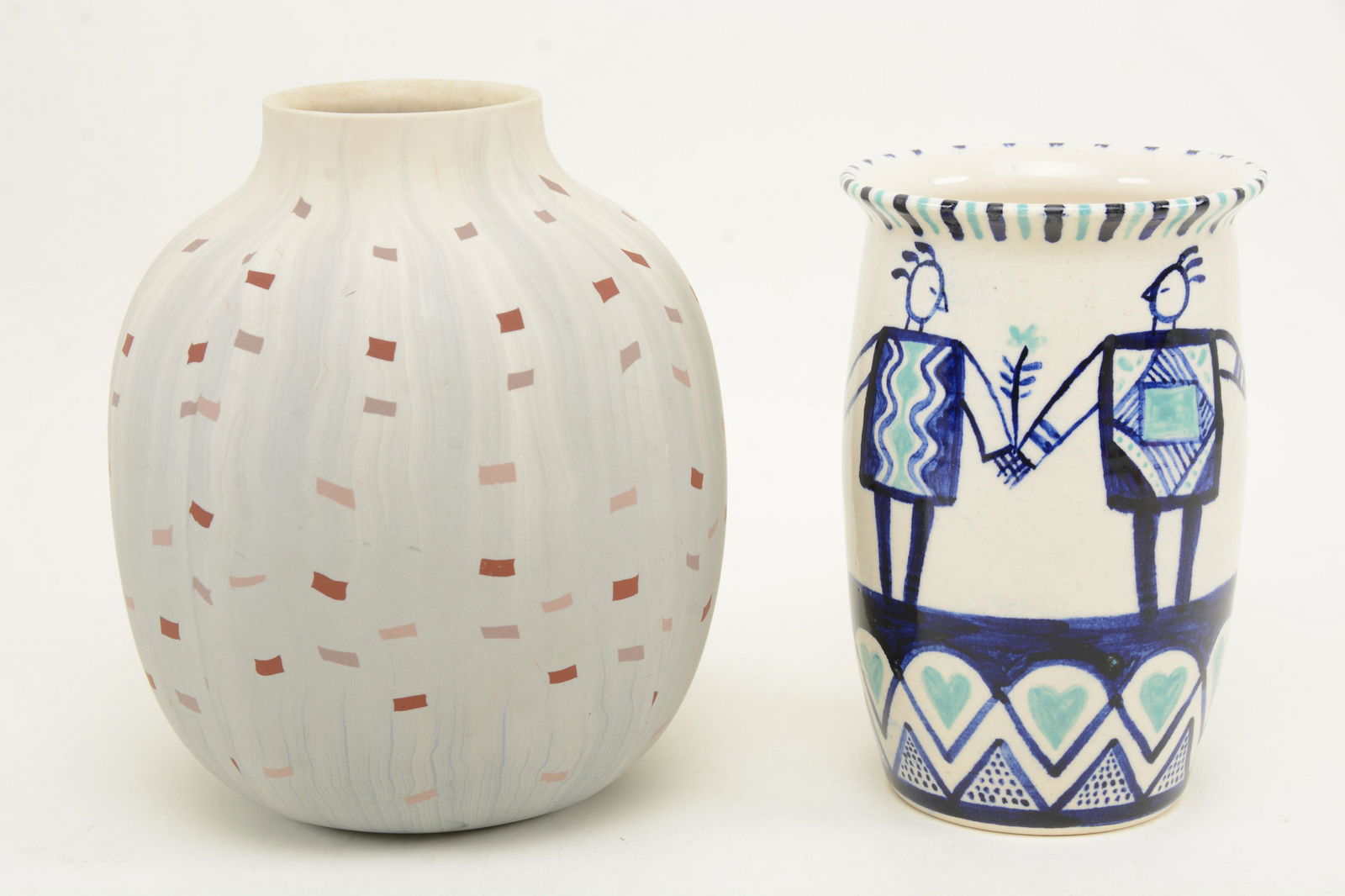 2 studio pottery vases. Vase of figures holding hands (1 of 6)