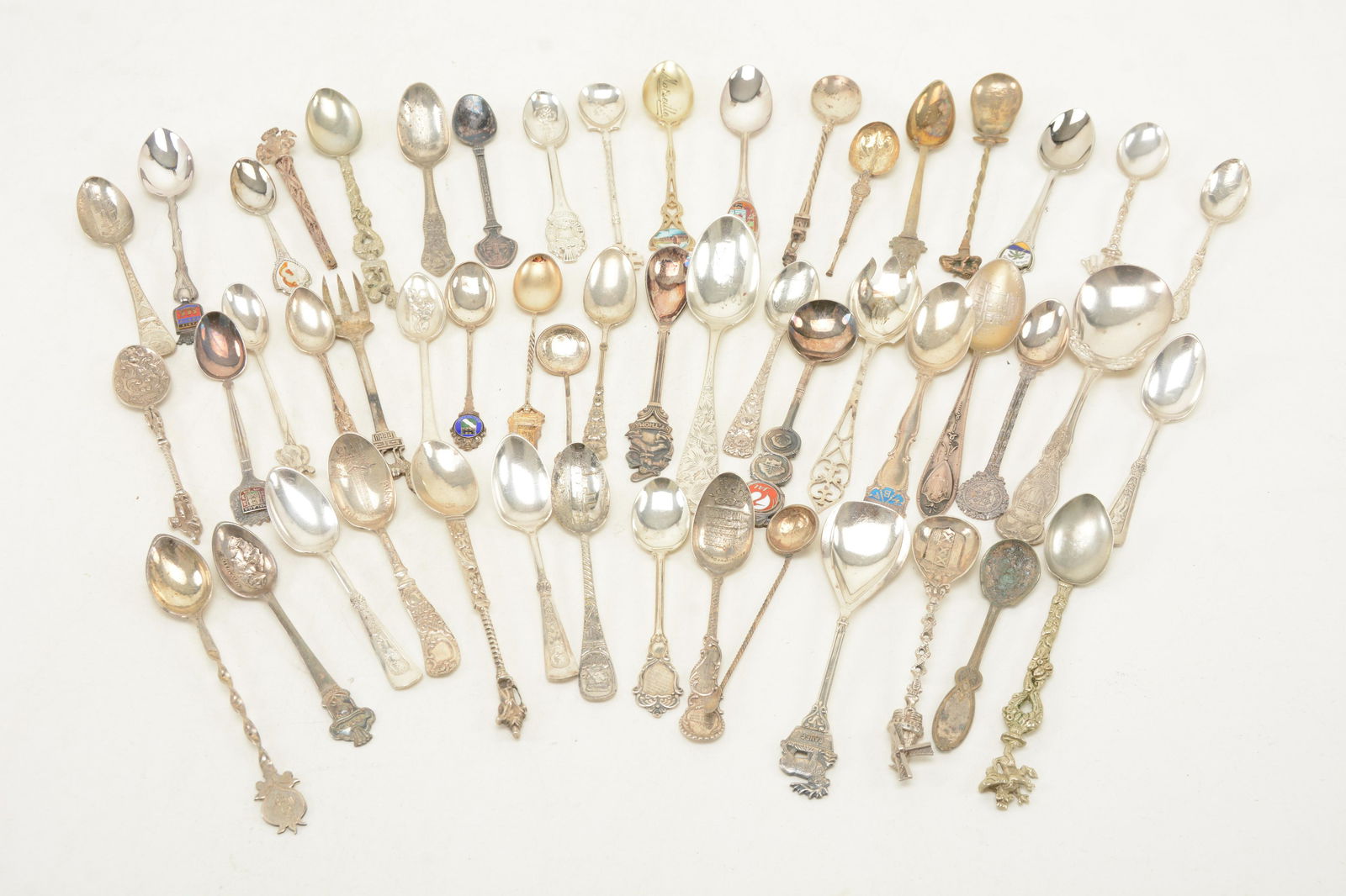Collection of souvenir spoons including sterling (1 of 9)