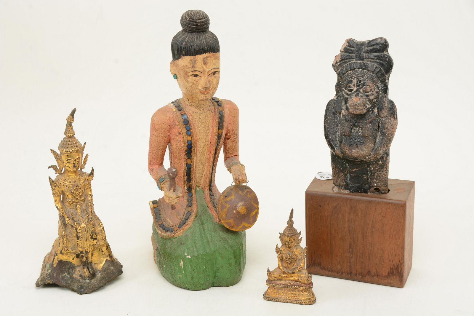 Group of four Thai figures; a small, gilded metal (1 of 10)