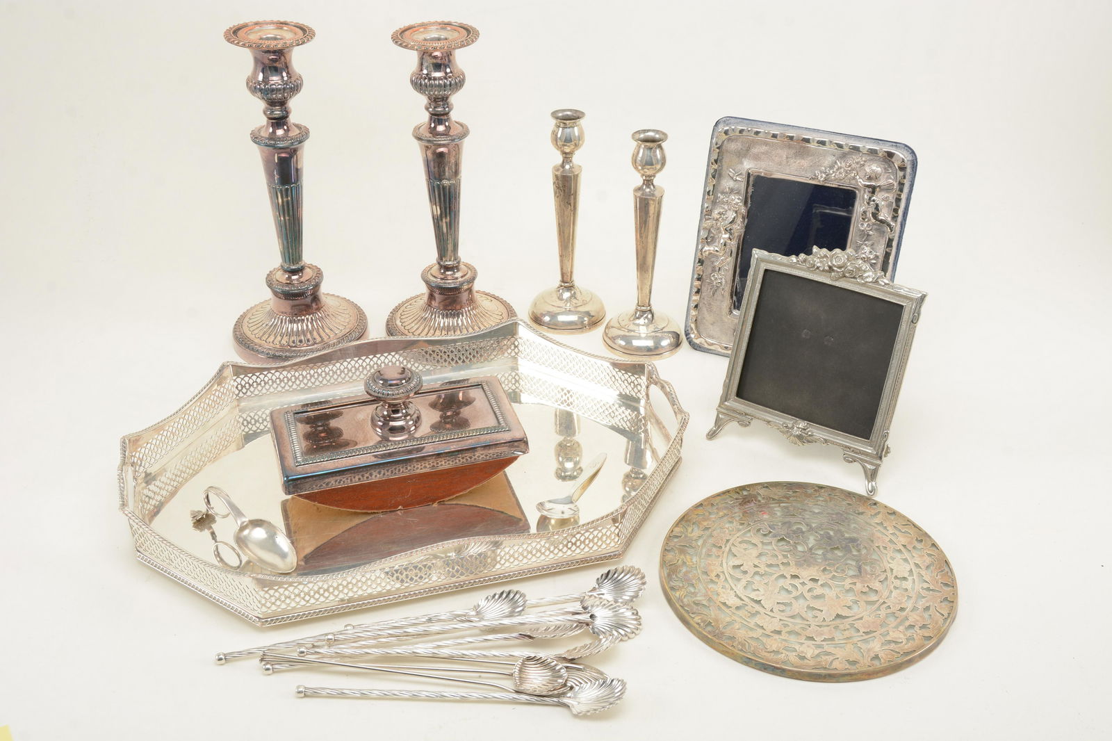 Sterling silver frame, sterling ice beverage straws,: Sterling silver frame, sterling ice beverage straws, silver overlay hot plate, Sheffield tray, plated lotter, Italian wine coaster and 2 pairs of weighted sterling candlesticks