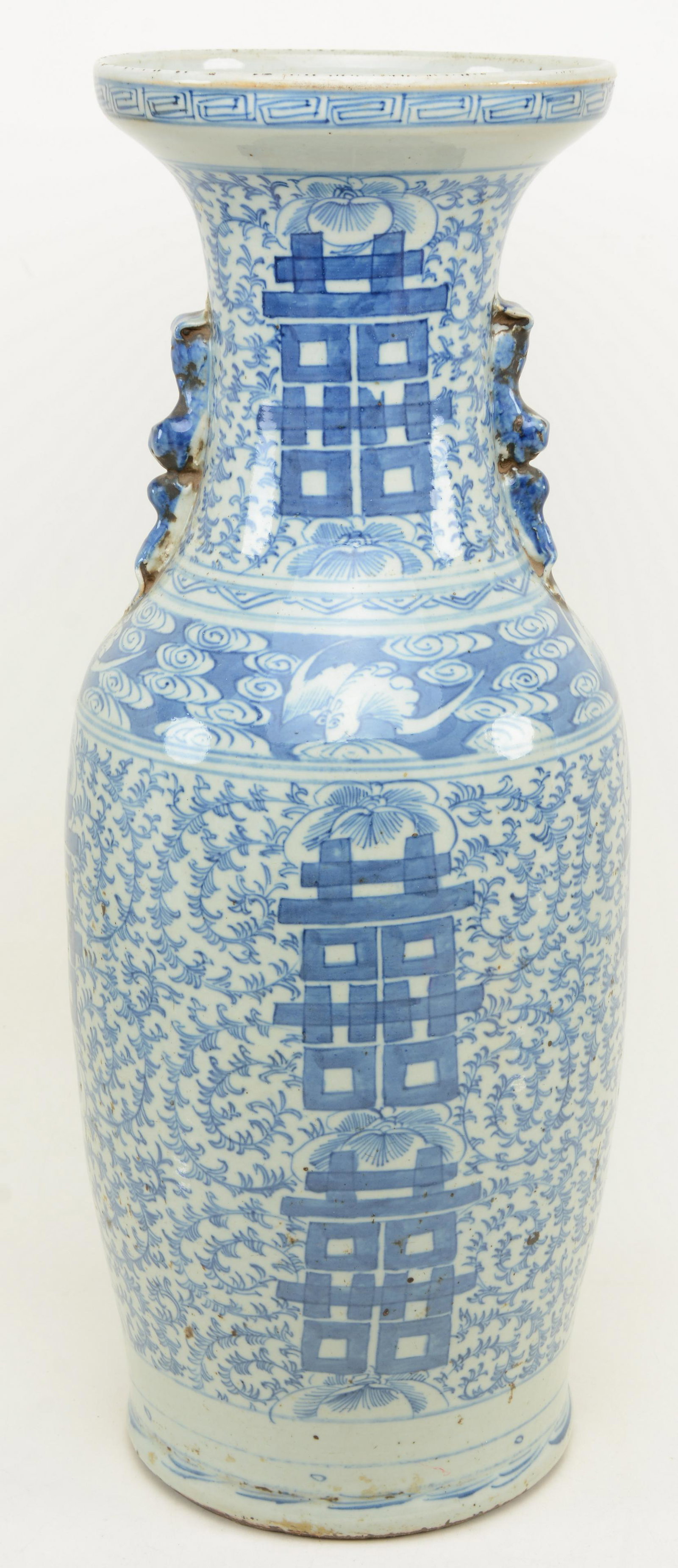 Chinese blue and white porcelain floor vase with animal: Chinese blue and white porcelain floor vase with animal handles. Rim frits. Wear consistent with age and use. 24 in height.