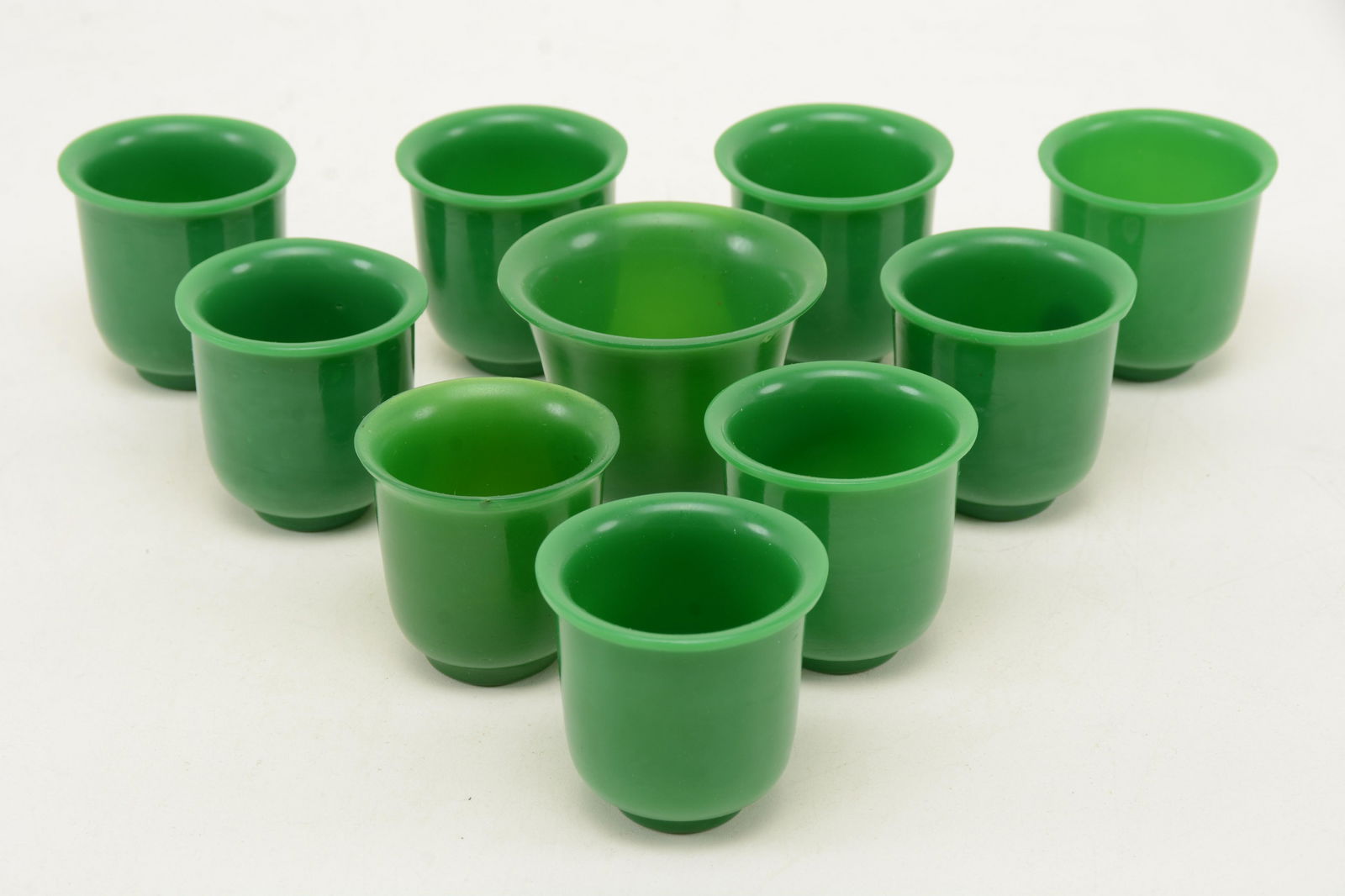 8 Peking glass cups, China 20 th  Century. Jade green (1 of 4)